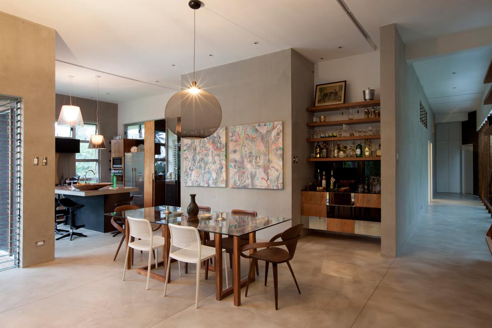 The eclectic Modern mix of chairs fills out the dining room set