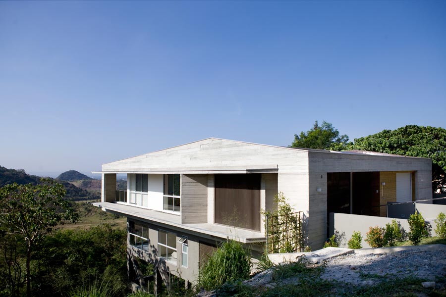 The most visible part of the MV House at street level is a volume encasing another volume