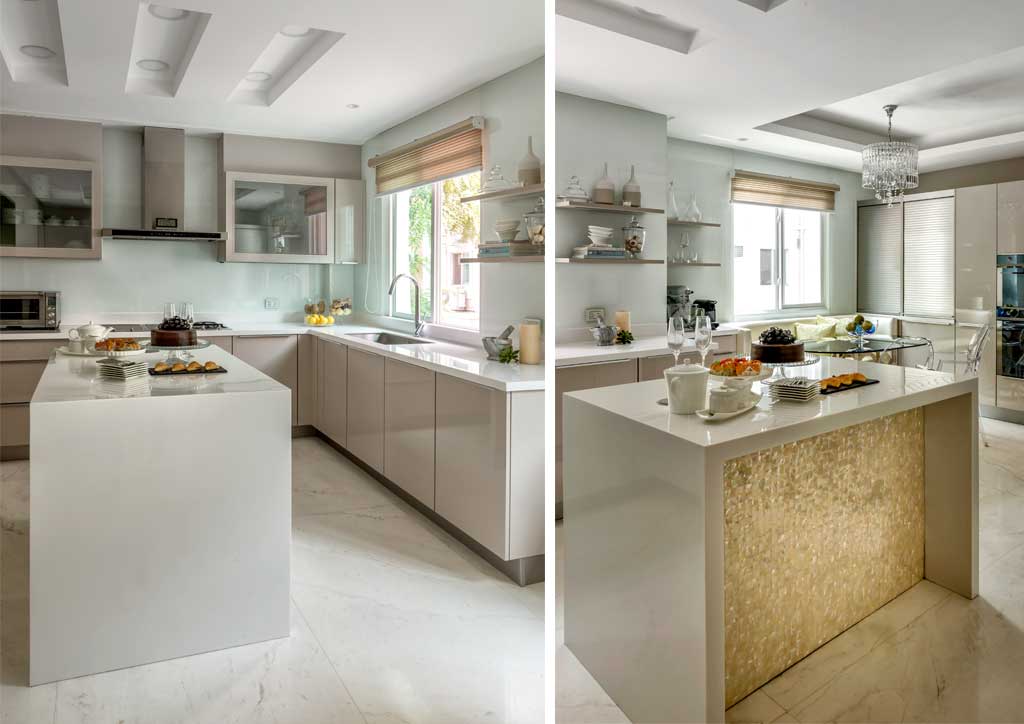 A lavish chandelier and plush circular rug serve to center off-white seating and a coffee table encrusted with mother-of- pearl in the high-ceilinged living area.