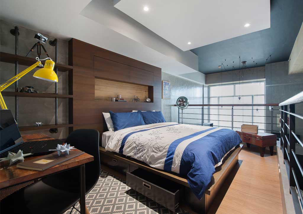 The living room was elevated to visually separate it from the rest of the unit. Elevating areas can segregate areas from the rest of the unit without using dividers.