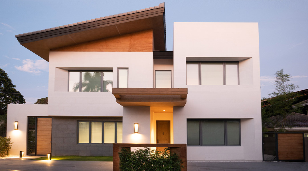 YY house, a modern home with an off white facade and geometric lines.