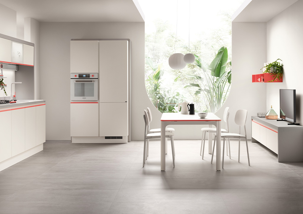 Spaces connect seamlessly through soft curves, decorative textures, and bright accent colours.