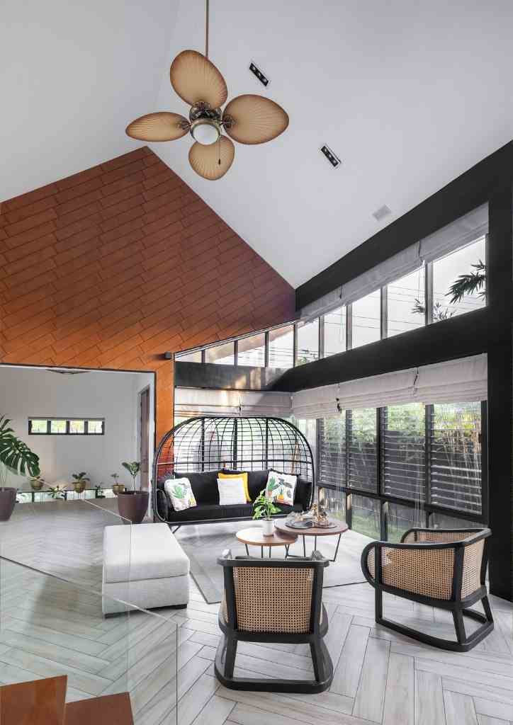 View of living room area featuring a mix of modern and traditional furniture