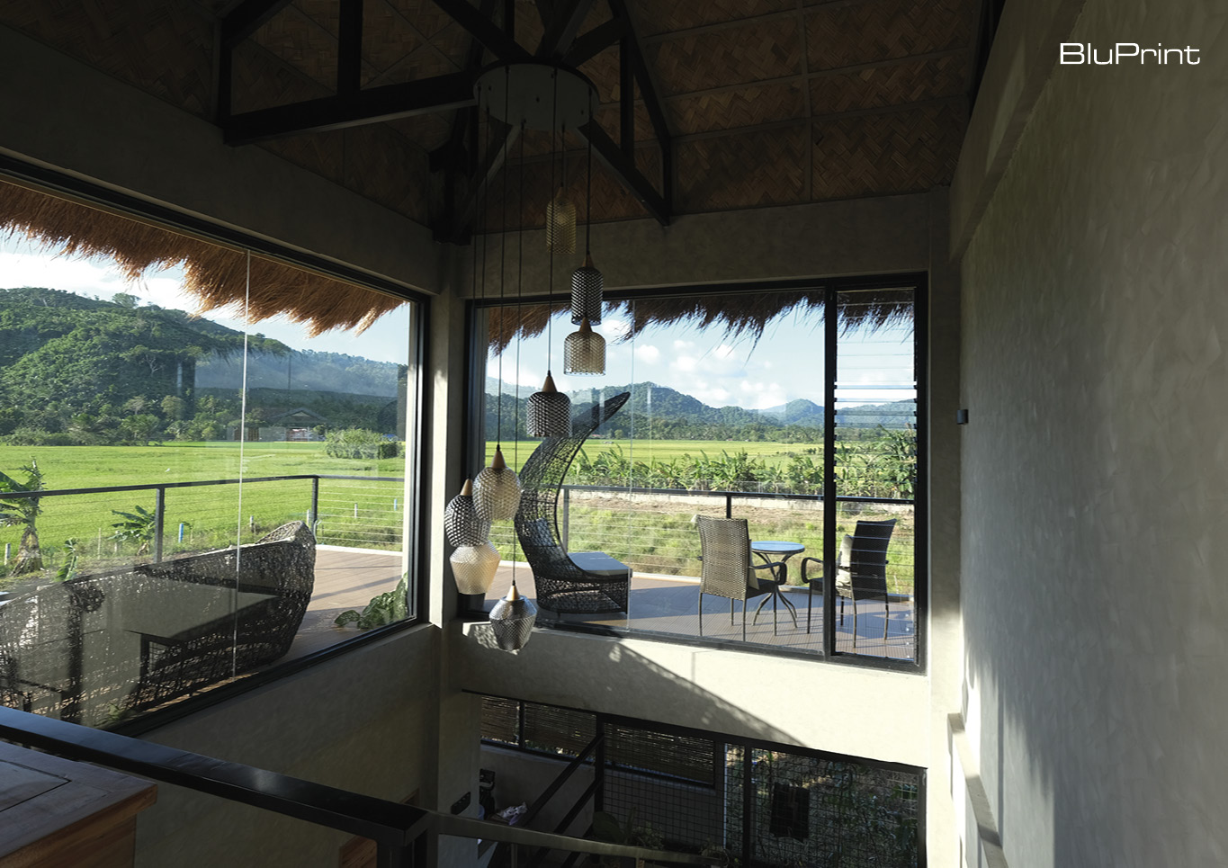 Modern bahay kubo floor-to-ceiling windows
