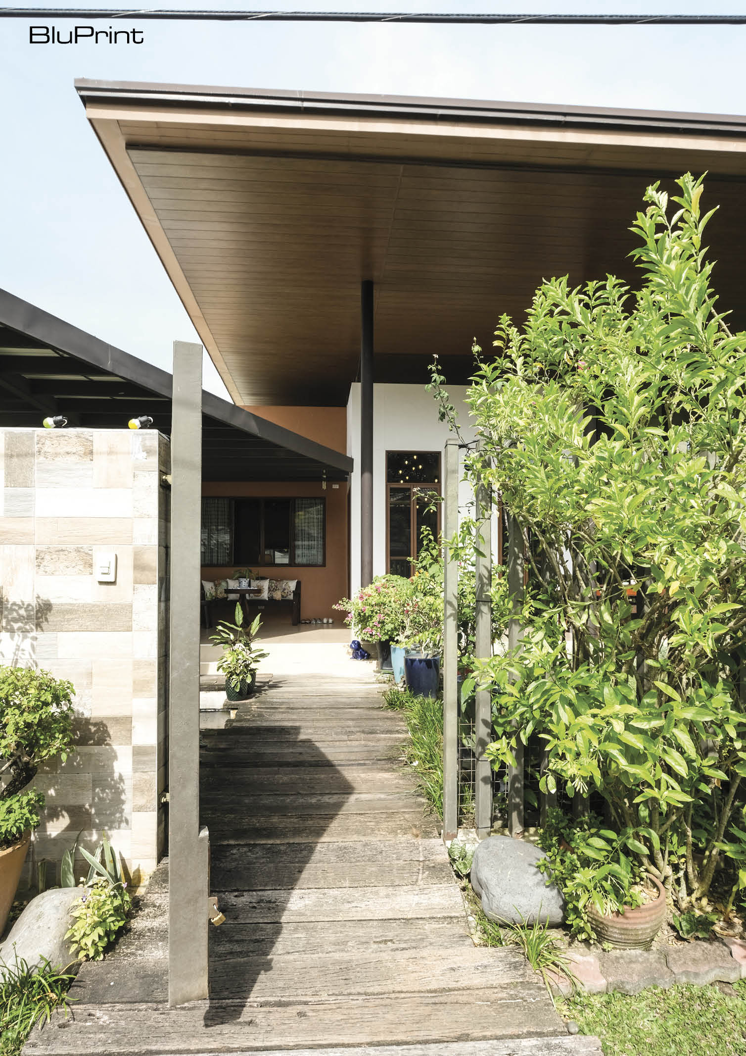 View of the front of the house through the pedestrian gate
