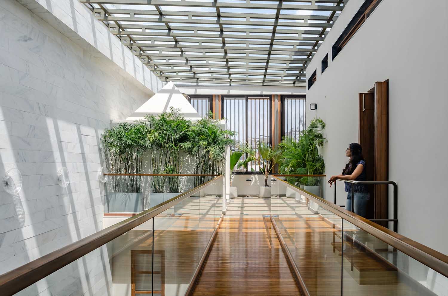 With the large central skylight, The Breathing House totally breathes in all of nature's seasons. Image by Ar. Pratik Chandresha