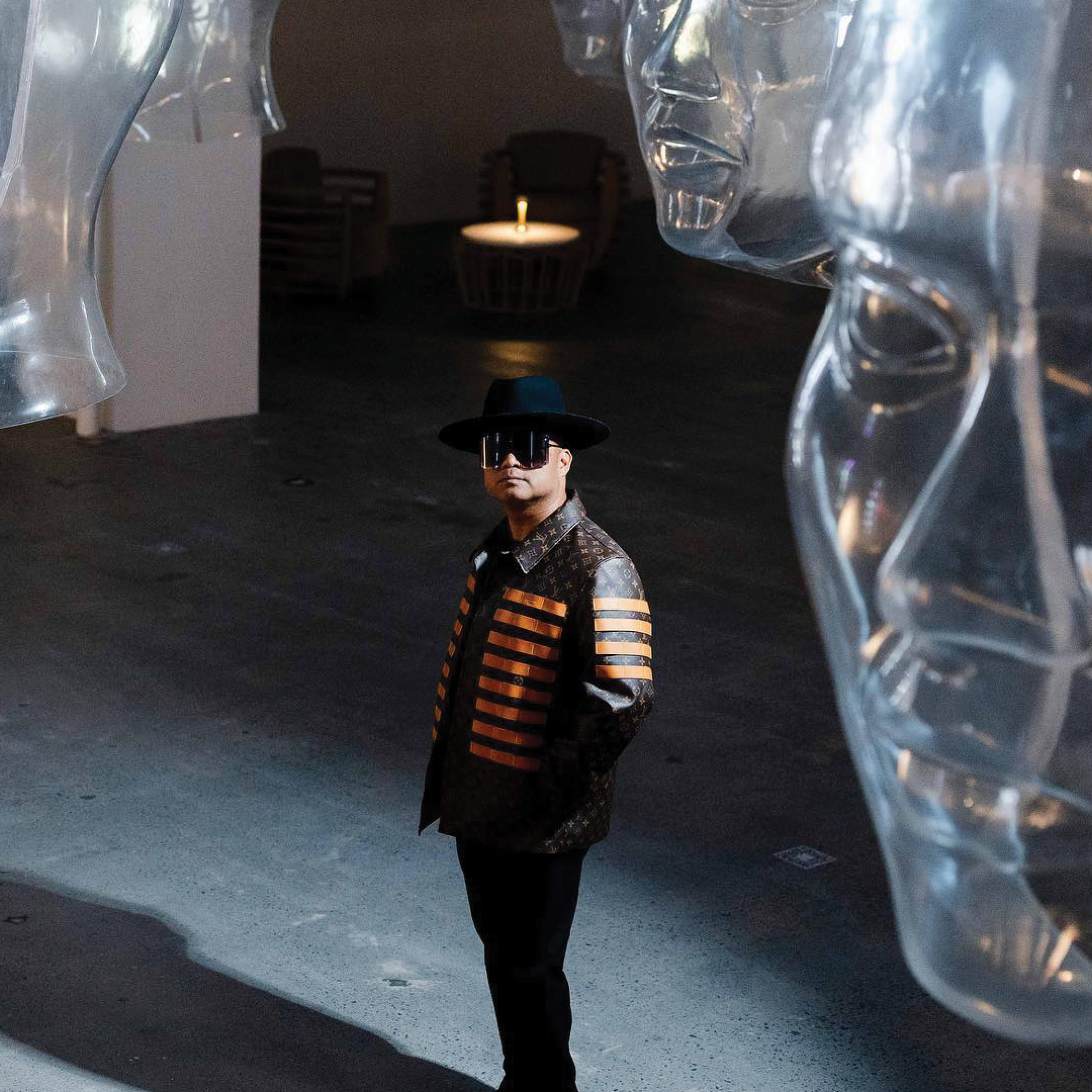 renowned contemporary artist, Jefre Figueras-Manuel, or Jefrë as he’s more commonly known standing amongst his "Talking Heads" collection. Image from Studio Jefrë Facebook page