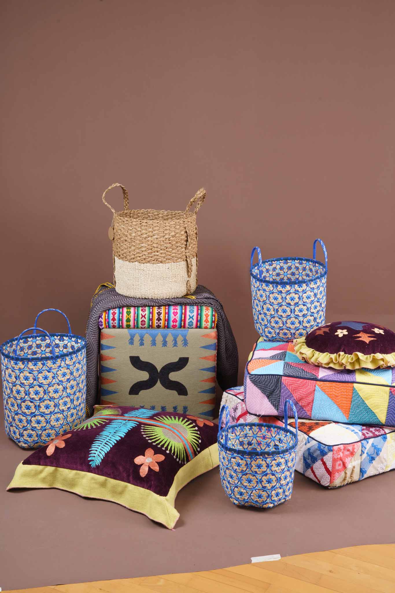 Brown Baskets from The Fine Life Market, Blue Baskets from Fibers, Pillows and Ottoman from TravelFund by Siriusdan, Floor Pillows from Abel Philippines - BluPrint