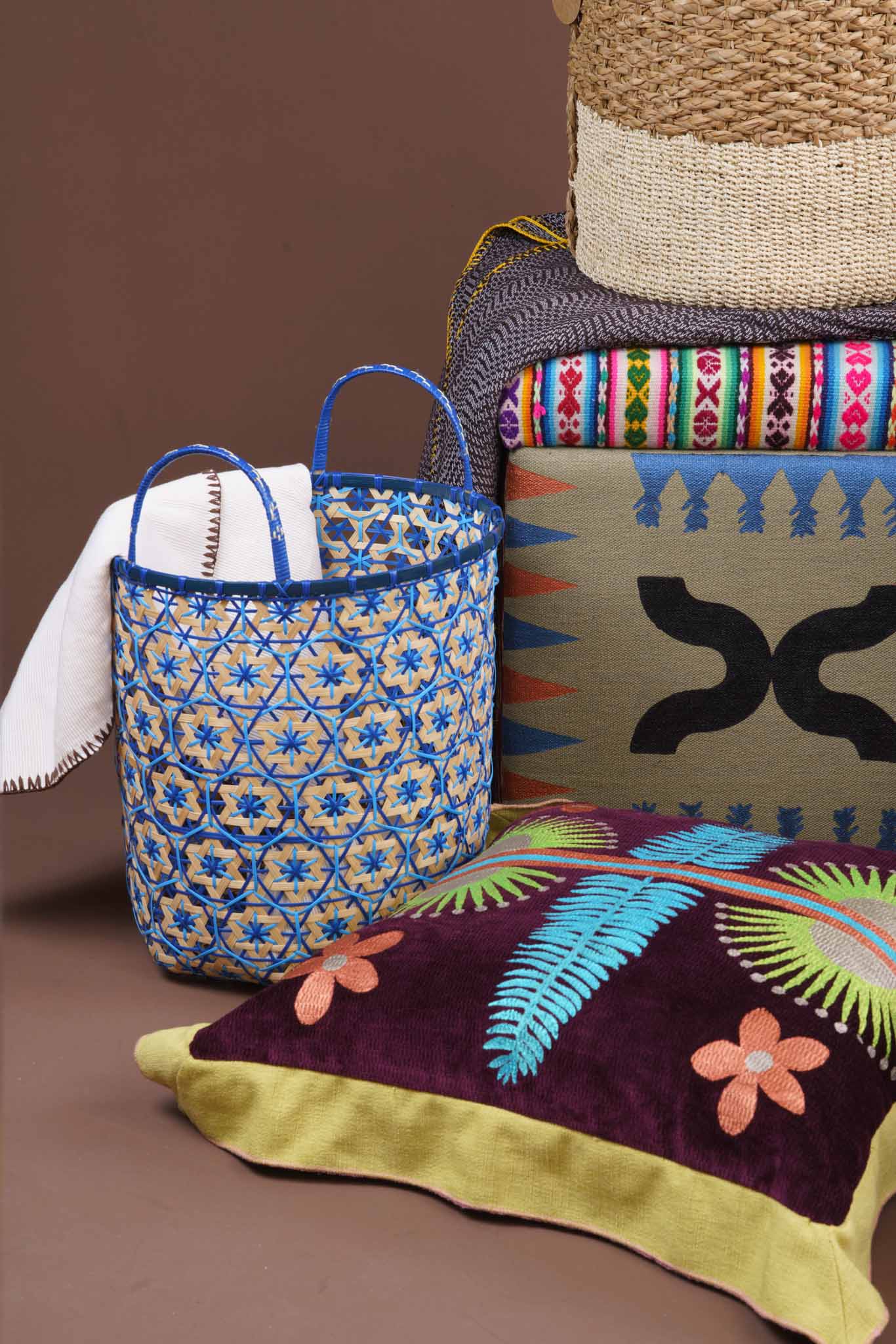Brown Baskets from The Fine Life Market Blue Baskets from Fibers Pillows and Ottoman from TravelFund by Siriusdan - BluPrint