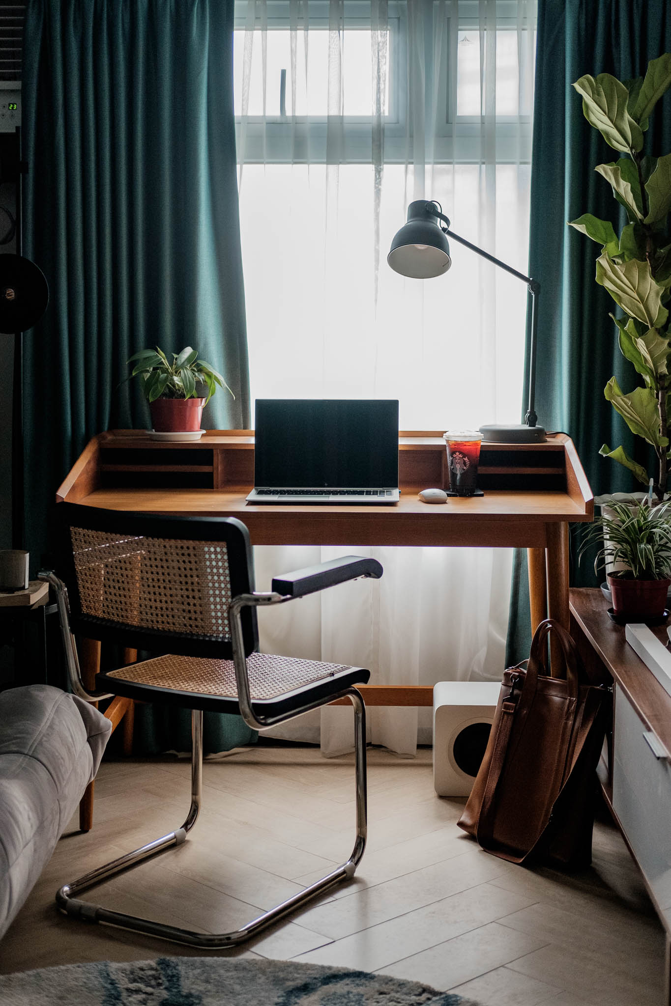 The office area features the Cesca Armchair paired with a Flavio Desk.