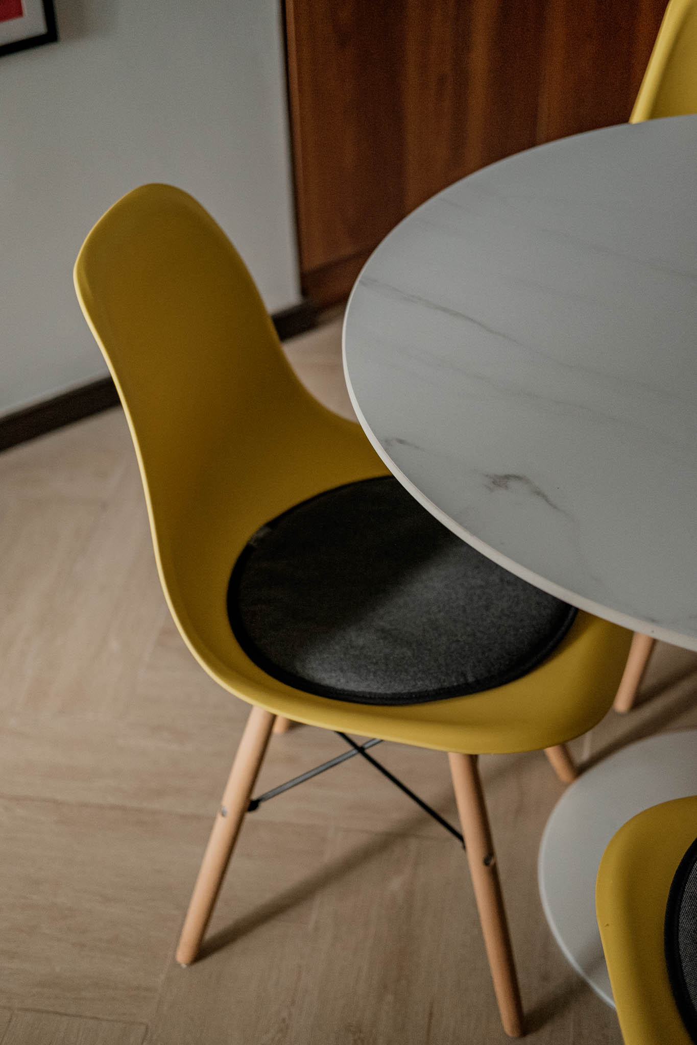 Eames-inspired yellow eggshell chair