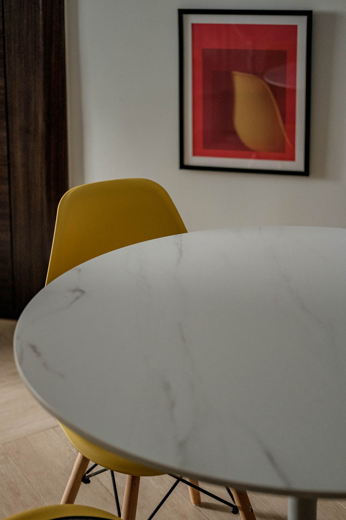 Eames-inspired yellow eggshell chair