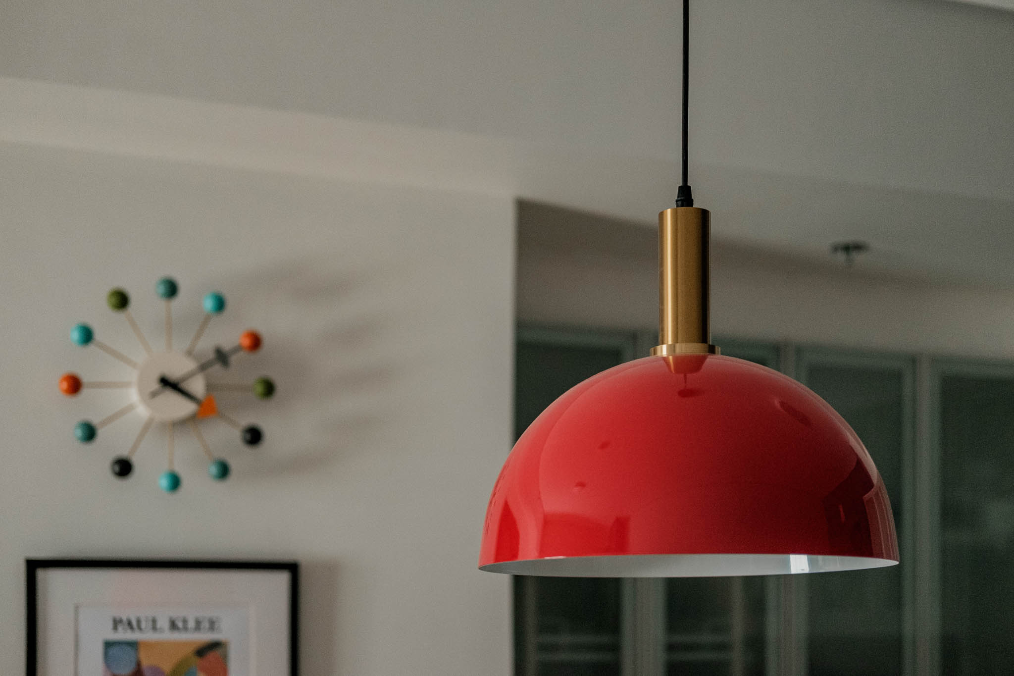 Another classic Eames design "The Hang It All" adds interesting element to the space.