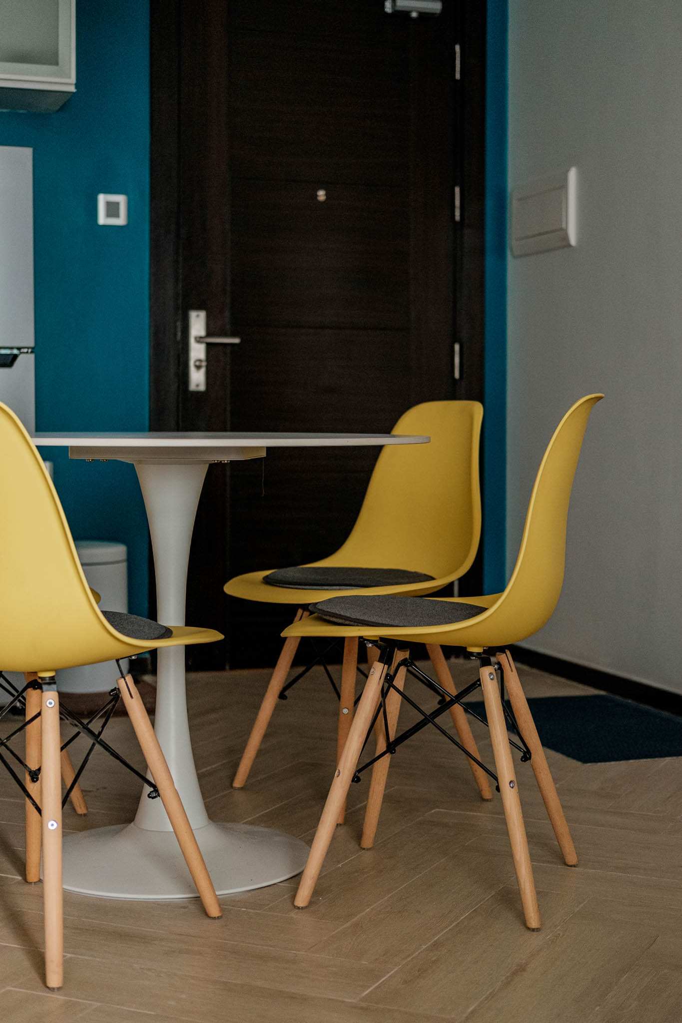 Eames-inspired yellow eggshell chair