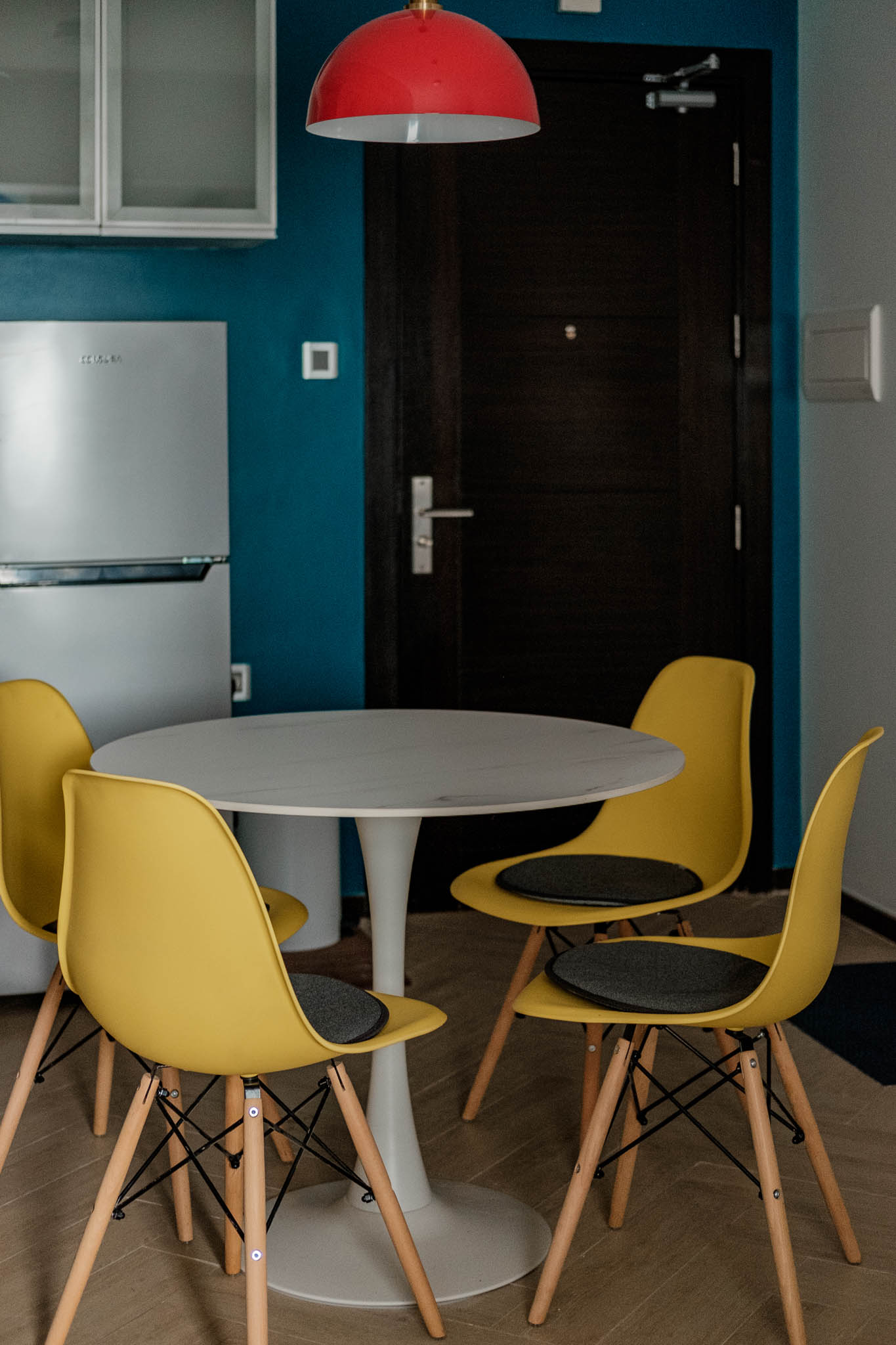 Eames-inspired yellow eggshell chair