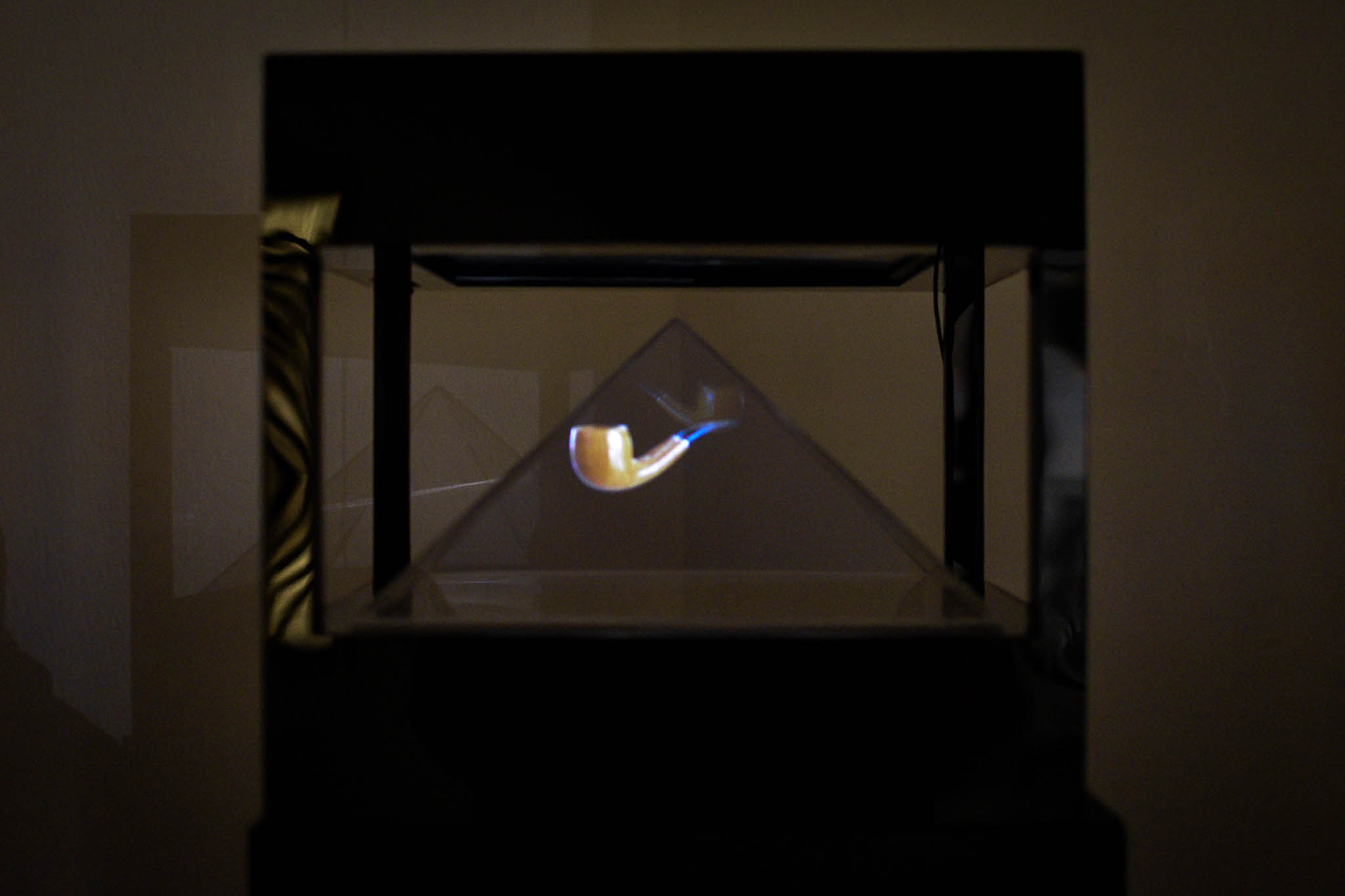 Hamill Buyco's hologram installation referencing Magritte's iconic pipe blurs the distinction between an object its painted image and its digital reconstruction.