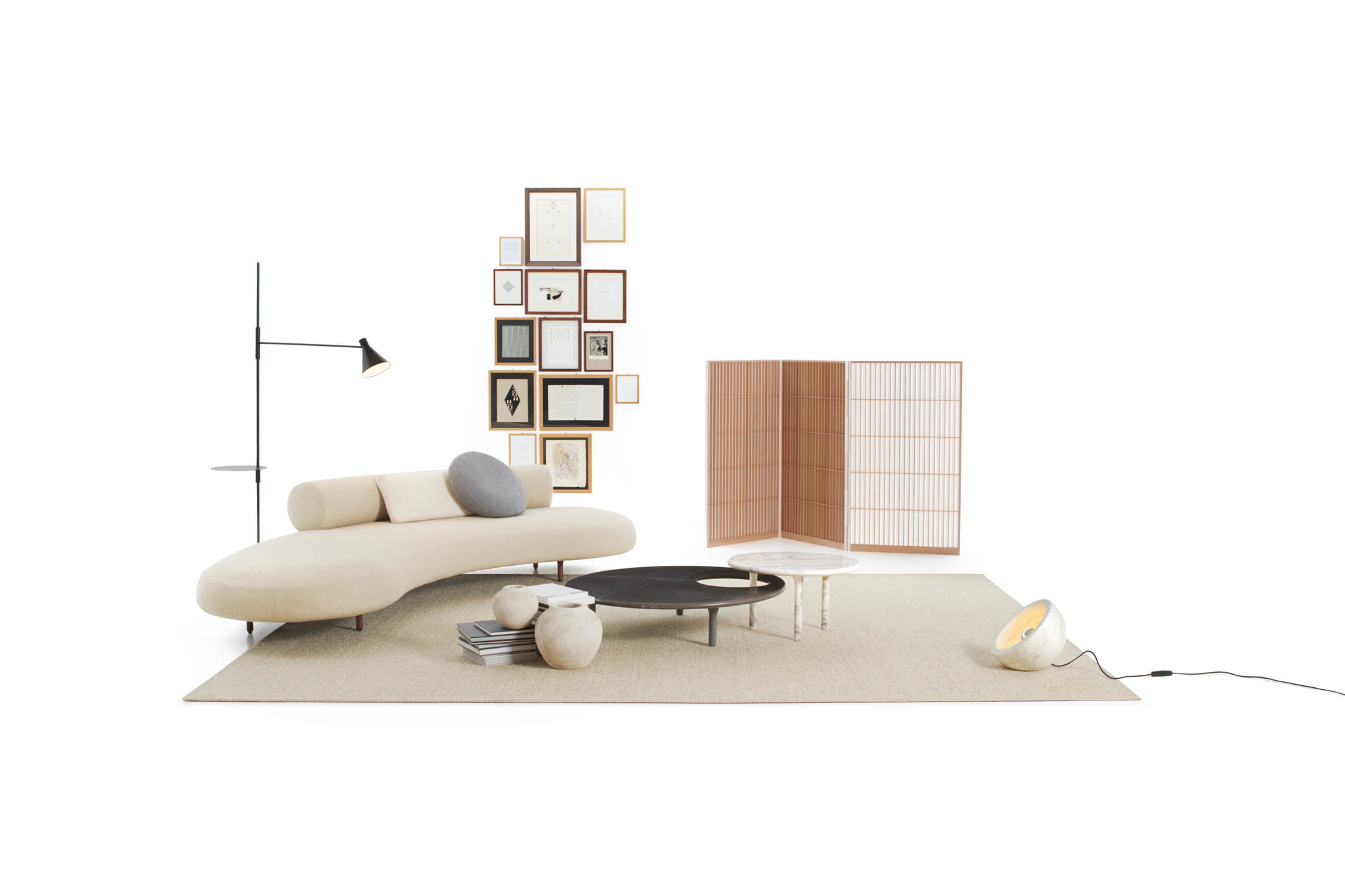 De Padova Honoré Sofa and Coffee Table by Elisa Ossino. Nota Lamp by Elisa Ossino (Left) and Tsuki Lamp by Naoto Fukasawa (Right)