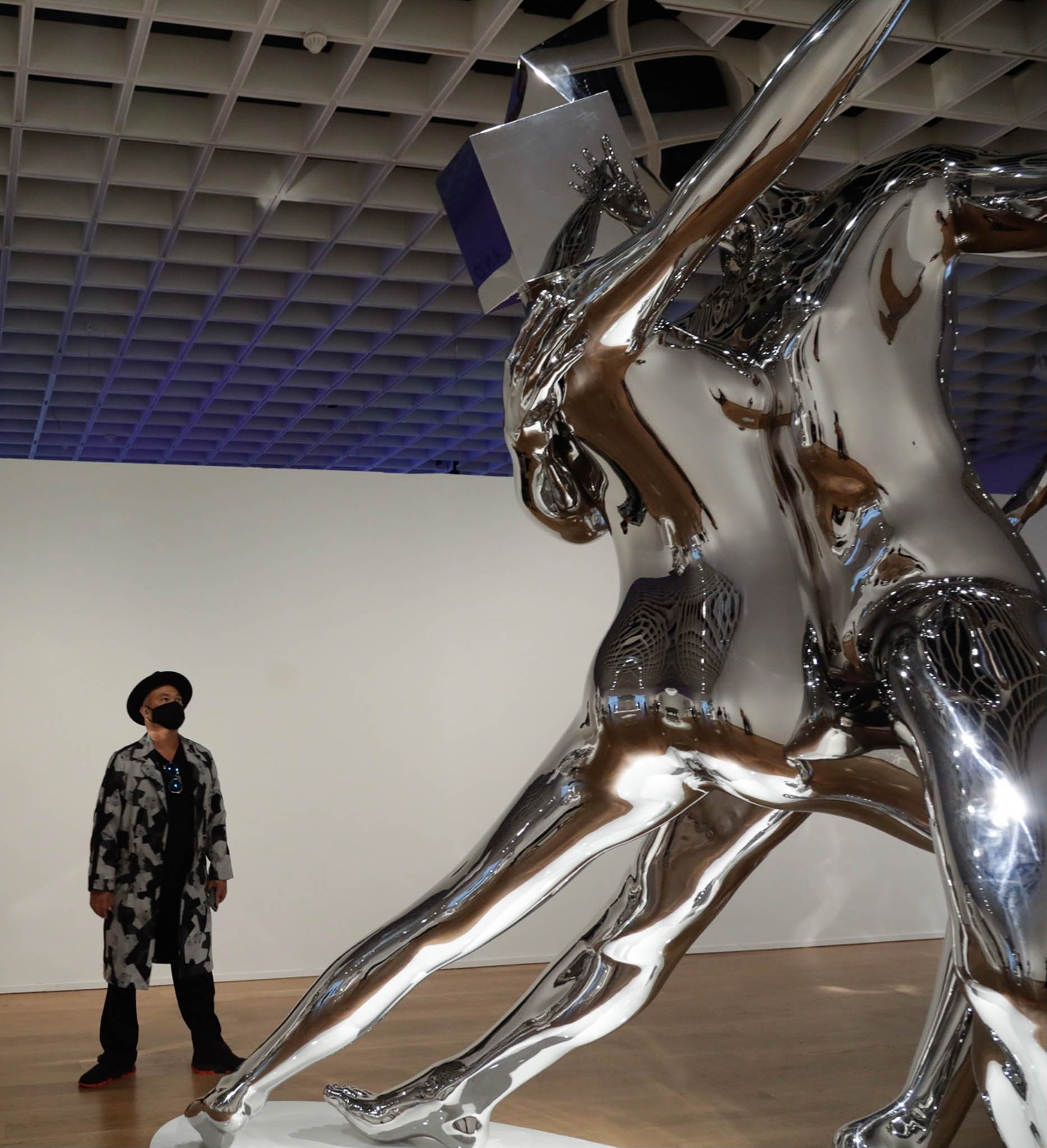 BluPrint-2023-December-IN-ARTICLE-(CULTURE PARIS EXHIBIT)-51 - BluPrint The artist standing next to one of his iconic metallic sculptures, "Passion"