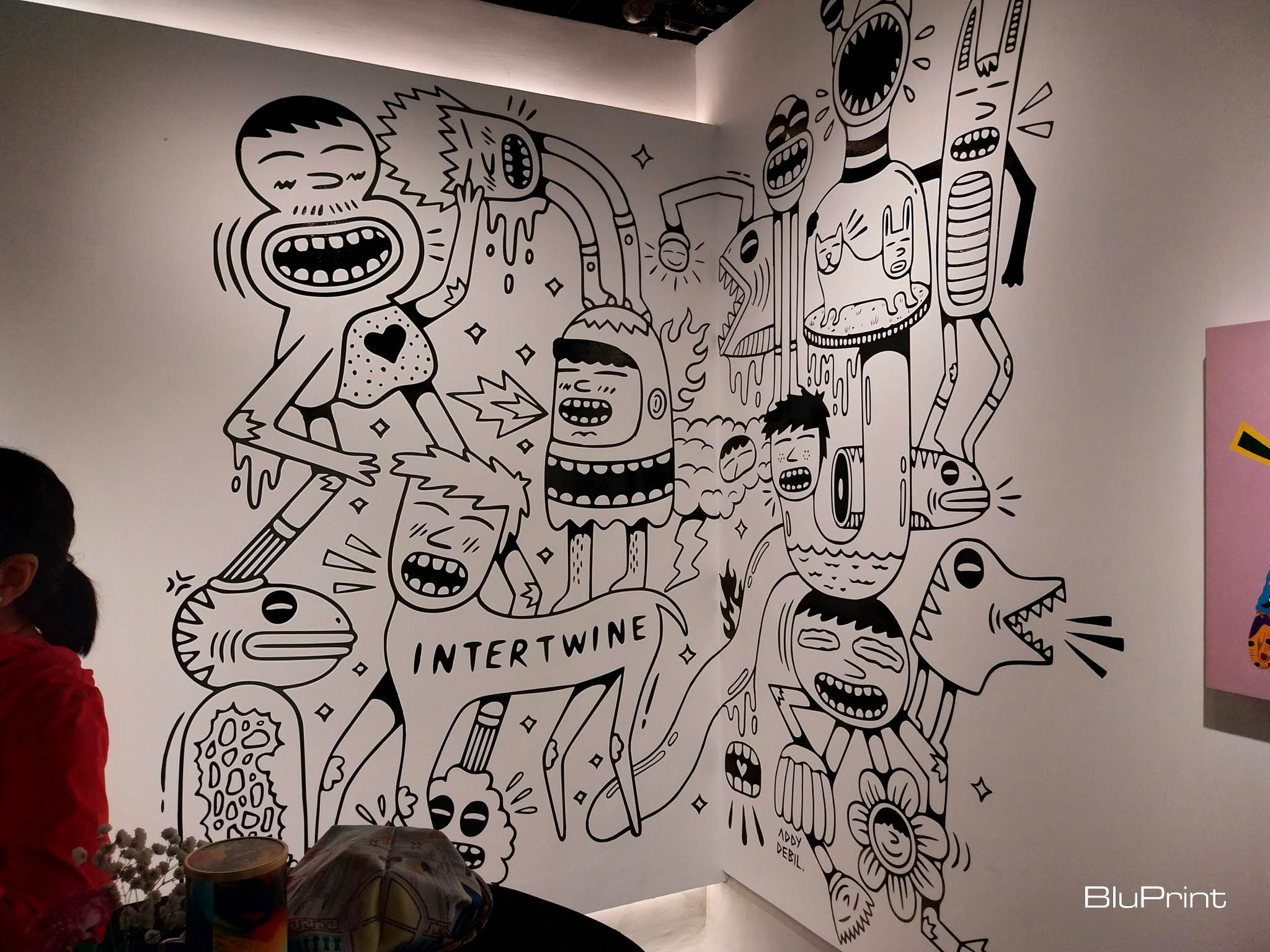 A photo of artwork for Addy Debil's "Intertwining Memory Lanes" exhibit for Galerie Stephanie x Cartellino. Photo by Elle Yap.