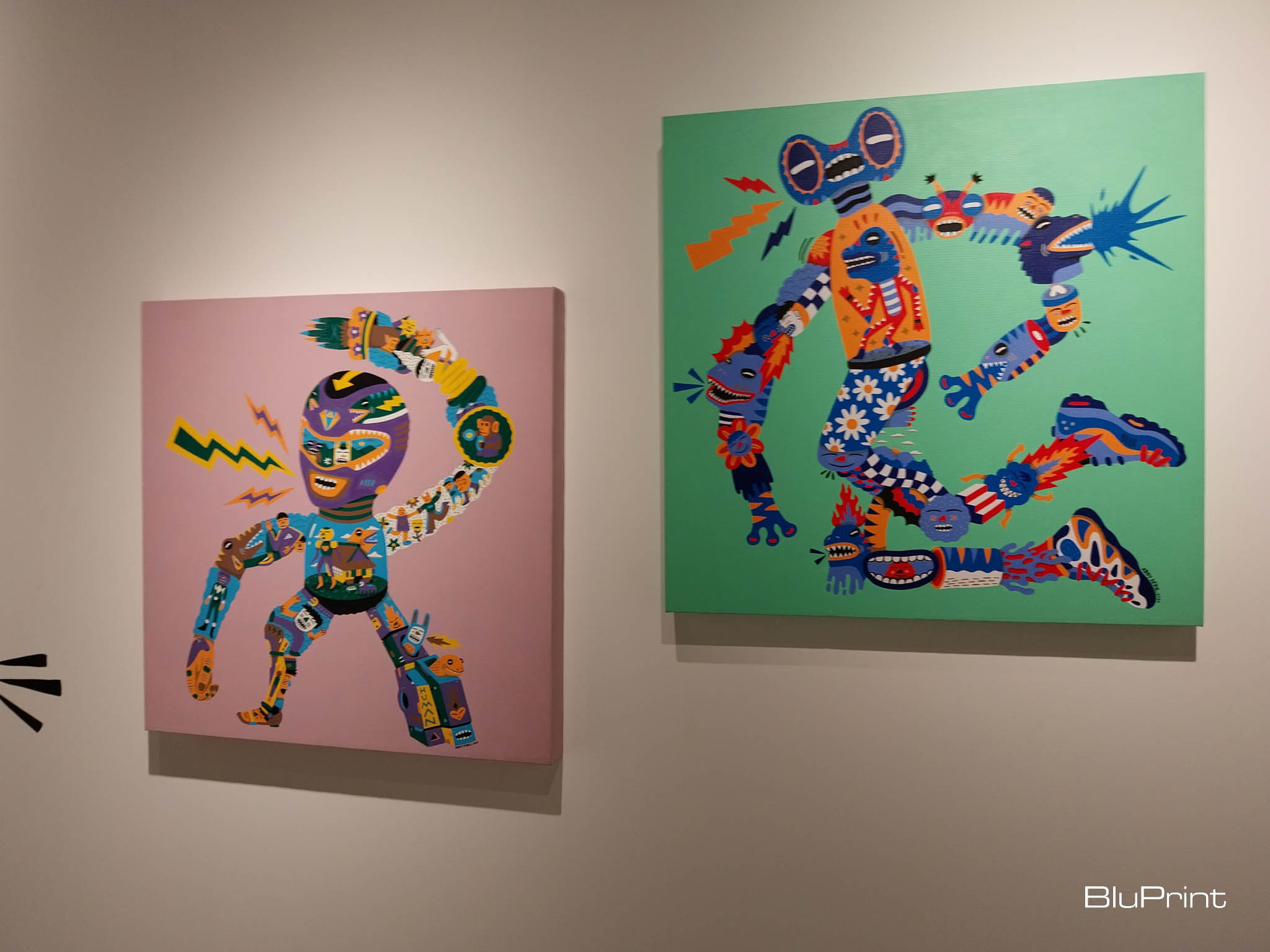 A photo of two painting for Addy Debil's "Intertwining Memory Lanes" exhibit for Galerie Stephanie x Cartellino. Photo by Elle Yap.