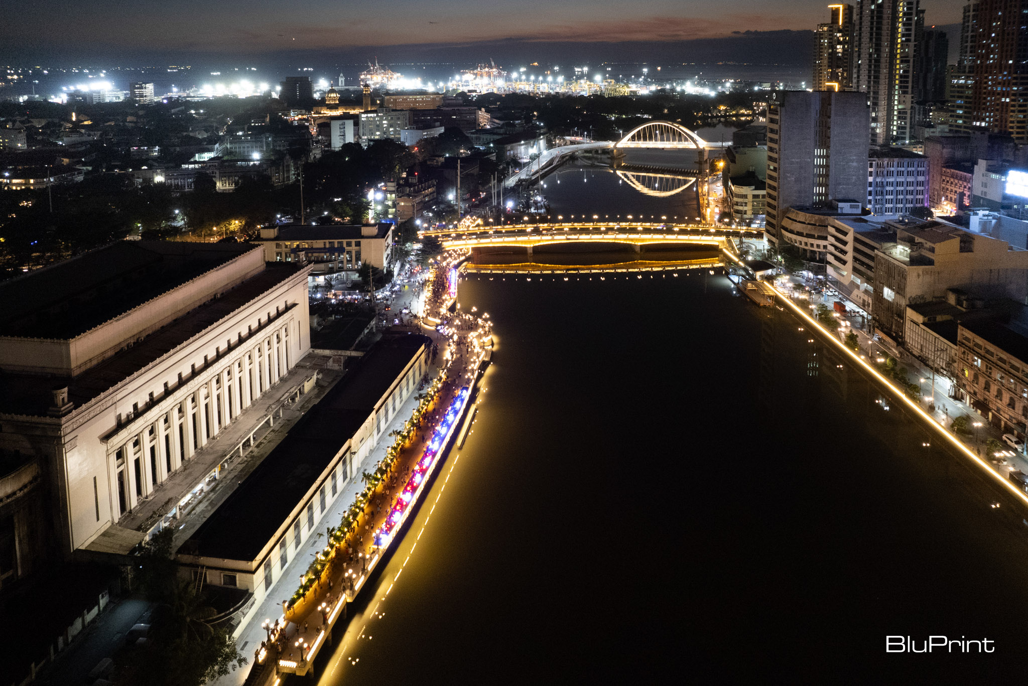 An aerial view of the esplanade along the Pasig River next to the Manila Central Post Office.
