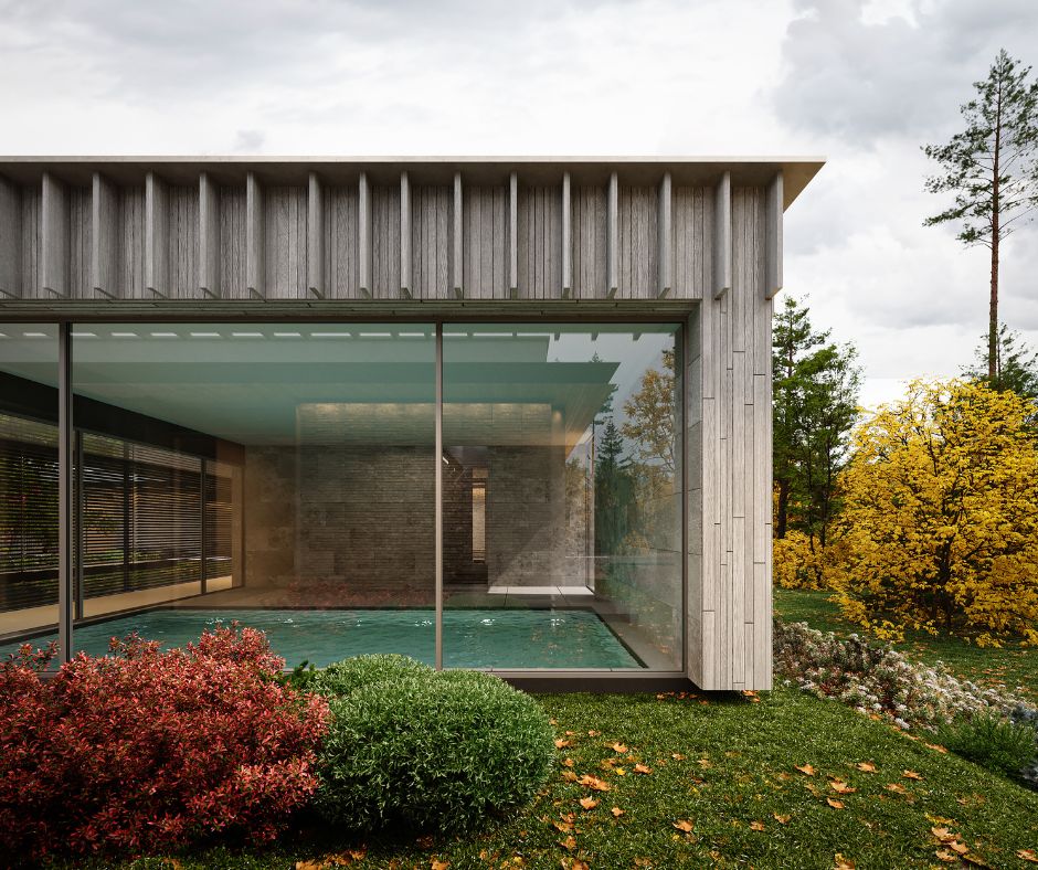 An indoor pool inside a modern bungalow house design with flat roof and clean lines.
