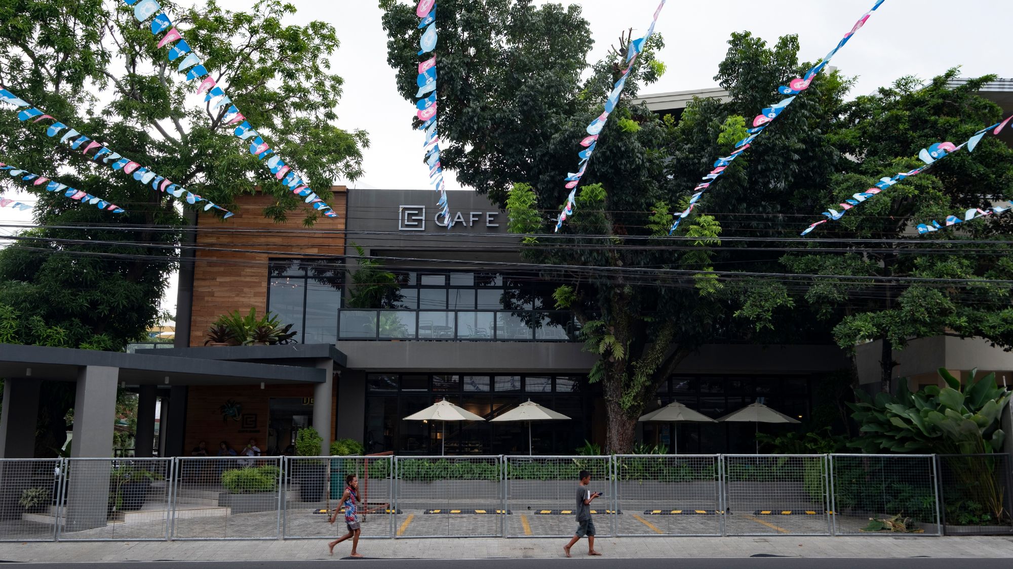 The dark industrial exterior of Cafe Bobs designed by Larawan Ink in Bacolod.