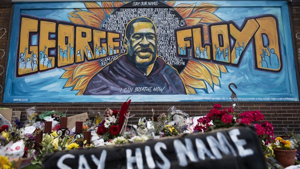 a graffiti mural of George Floyd.