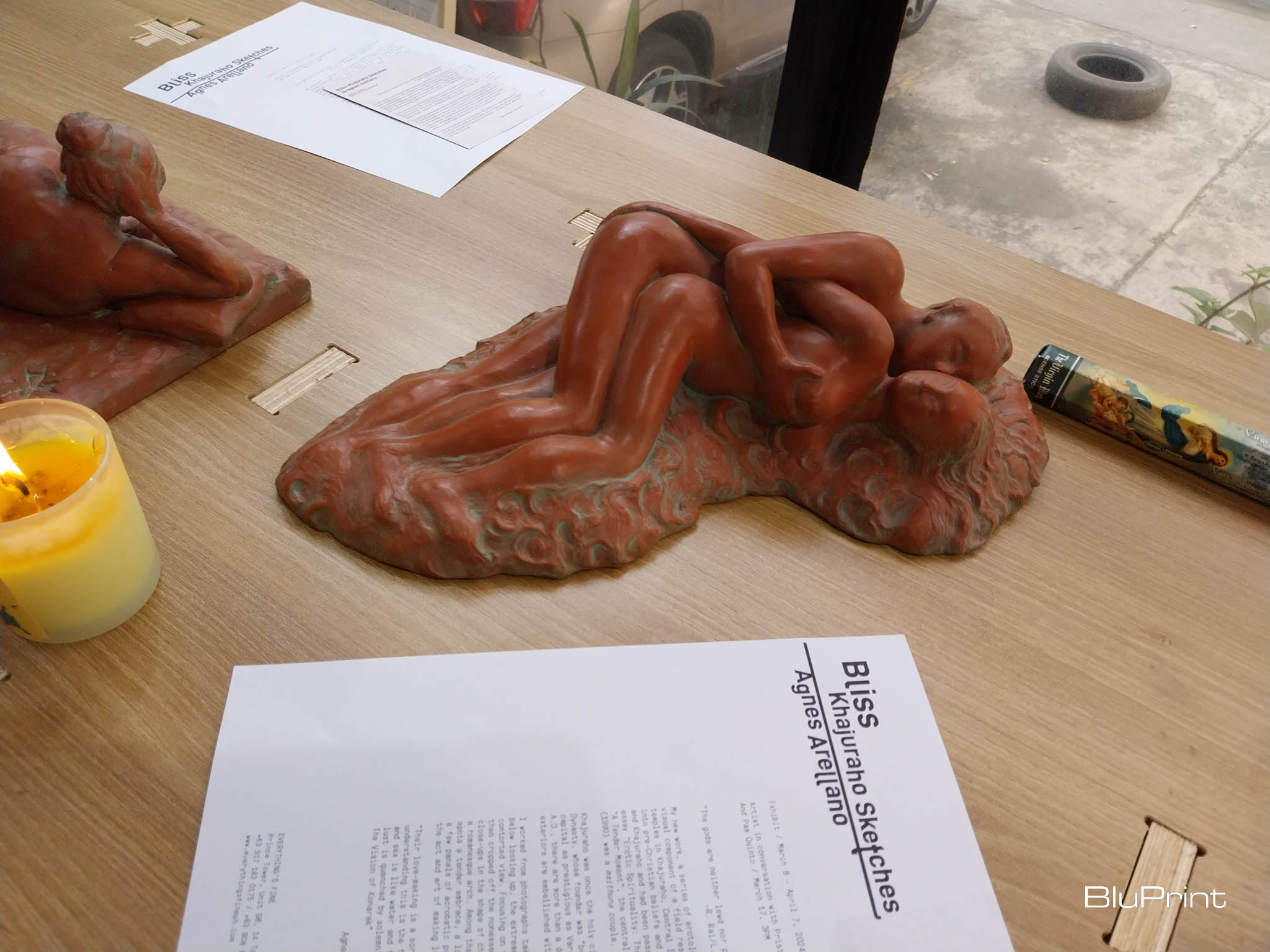 One of the table sculptures of a couple hugging. Photo by Elle Yap.