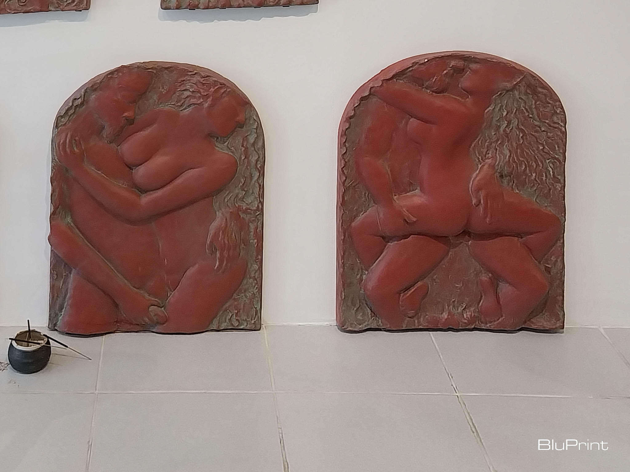 Sculptures in the bottom of the wall exhibit depicting sex acts. Photo by Elle Yap.