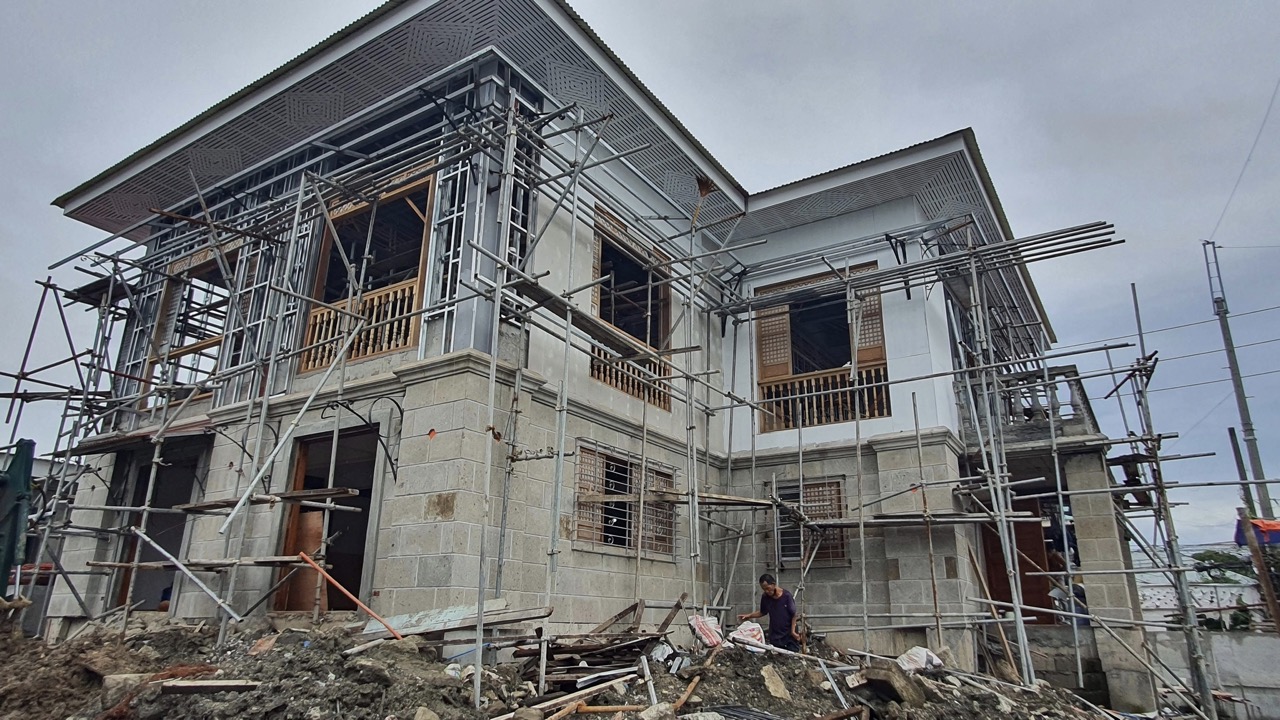 Construction in progress of Dr. Pio Valenzuela's bahay na bato, now a museum.