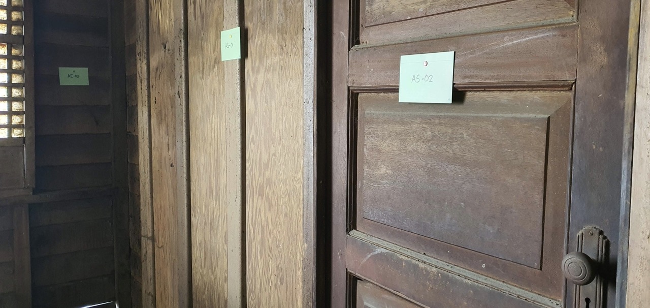 Detail of an old wooden door in a bahay na bato.