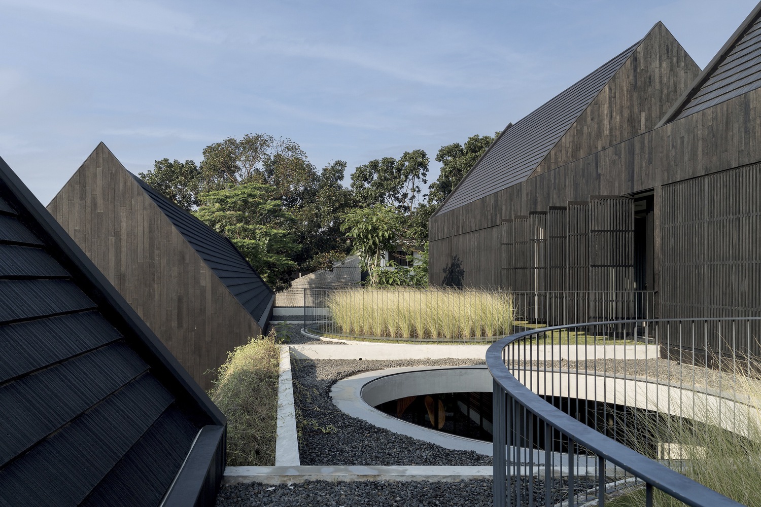 halo-house-tamara-wibowo-architects_9 - BluPrint The rooftops of Halo House. Photo by Andreaswidi.