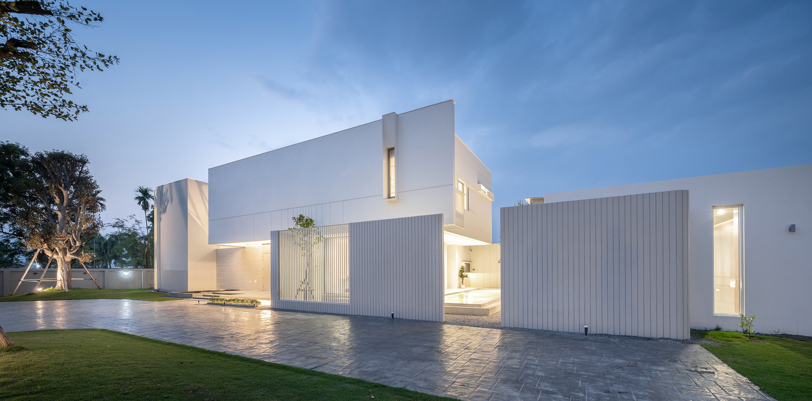 Angled view of modernist house.