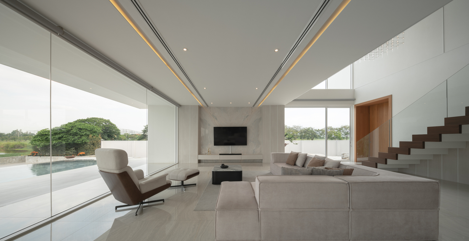 Living room interiors of Sunset House in Thailand. Photos by DOF Sky|Ground.