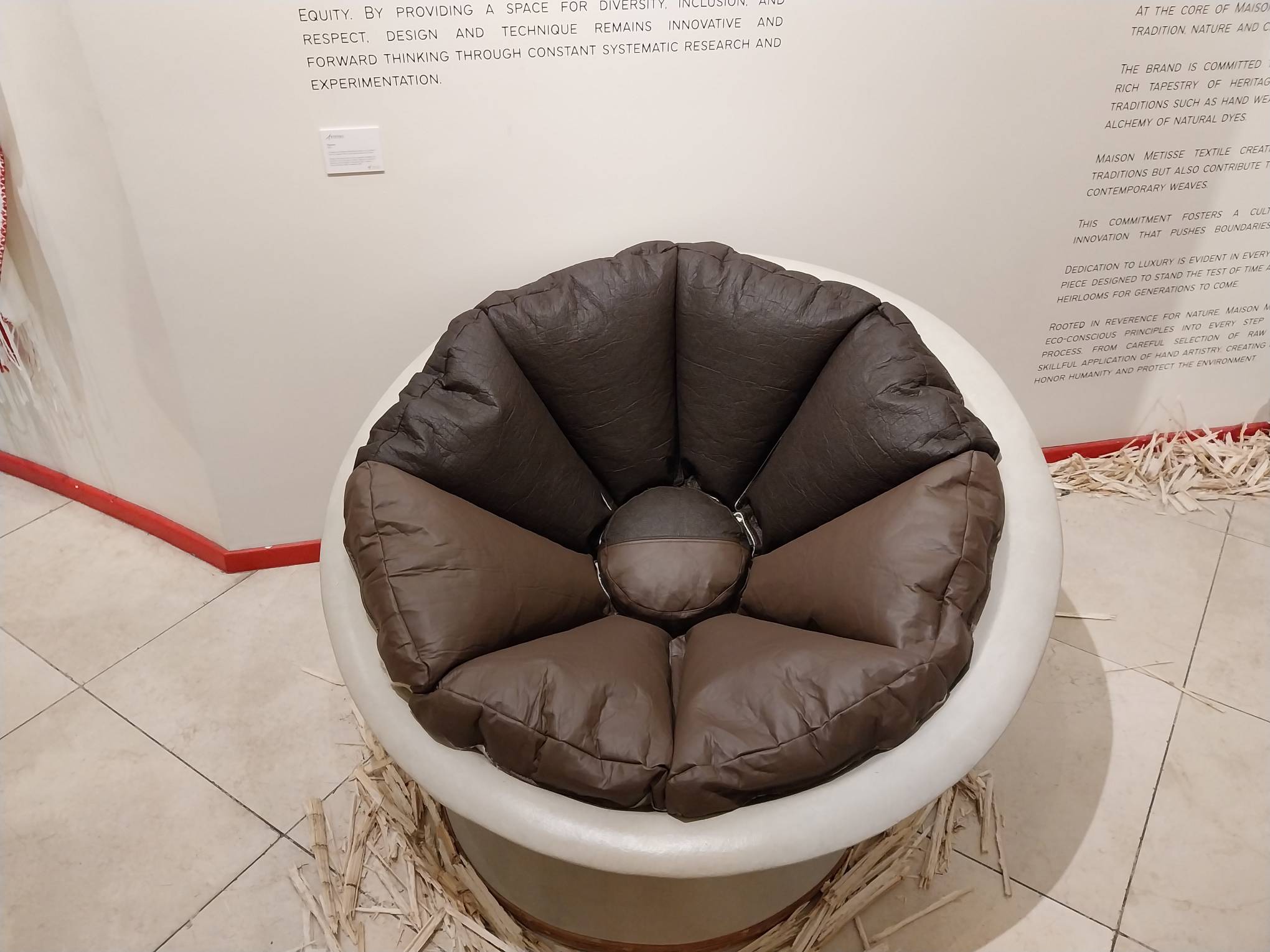 A circular chair shown in "Heritage in Bloom." Photo by Elle Yap.