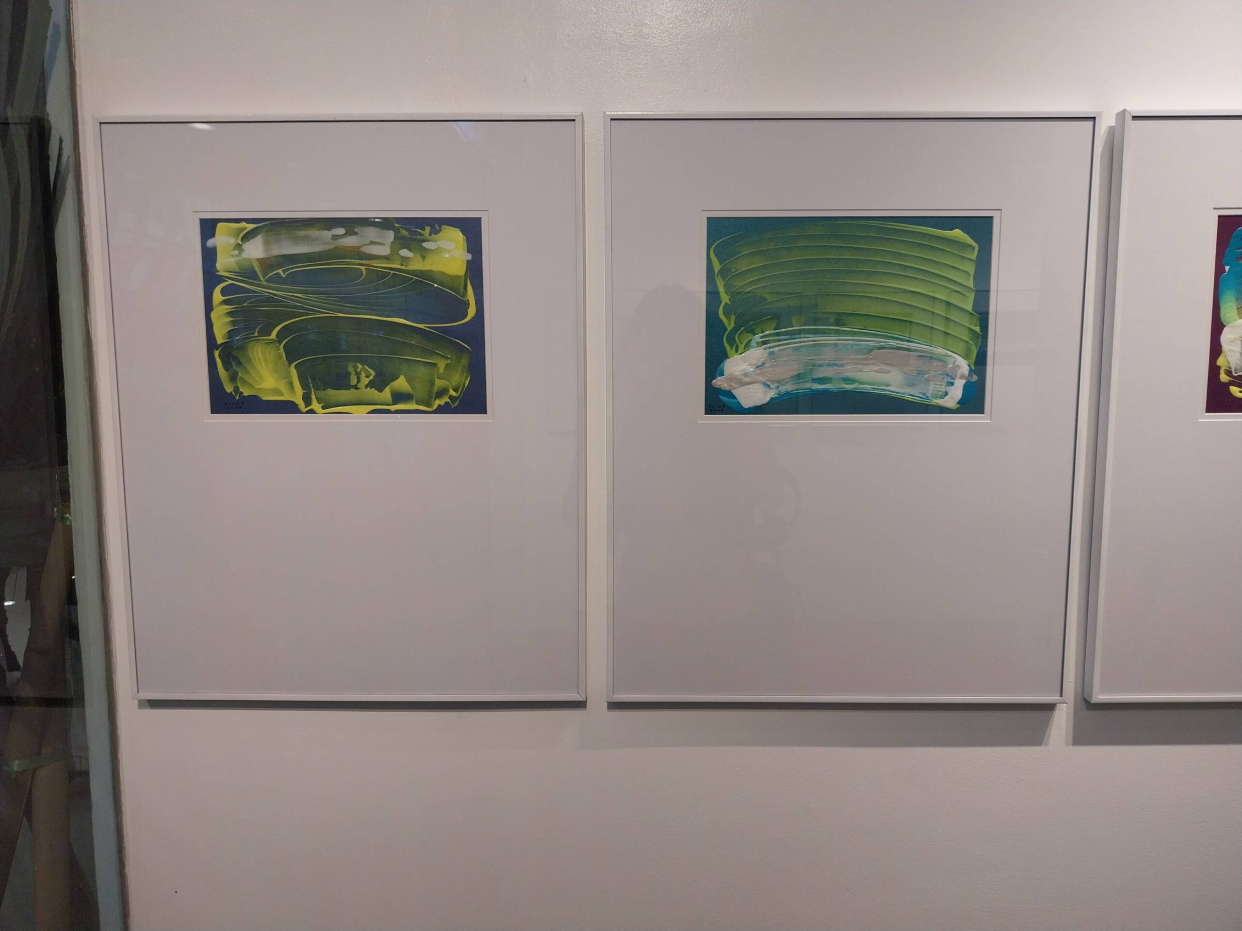 Abstract paintings that were featured in the exhibit. Photo by Elle Yap.