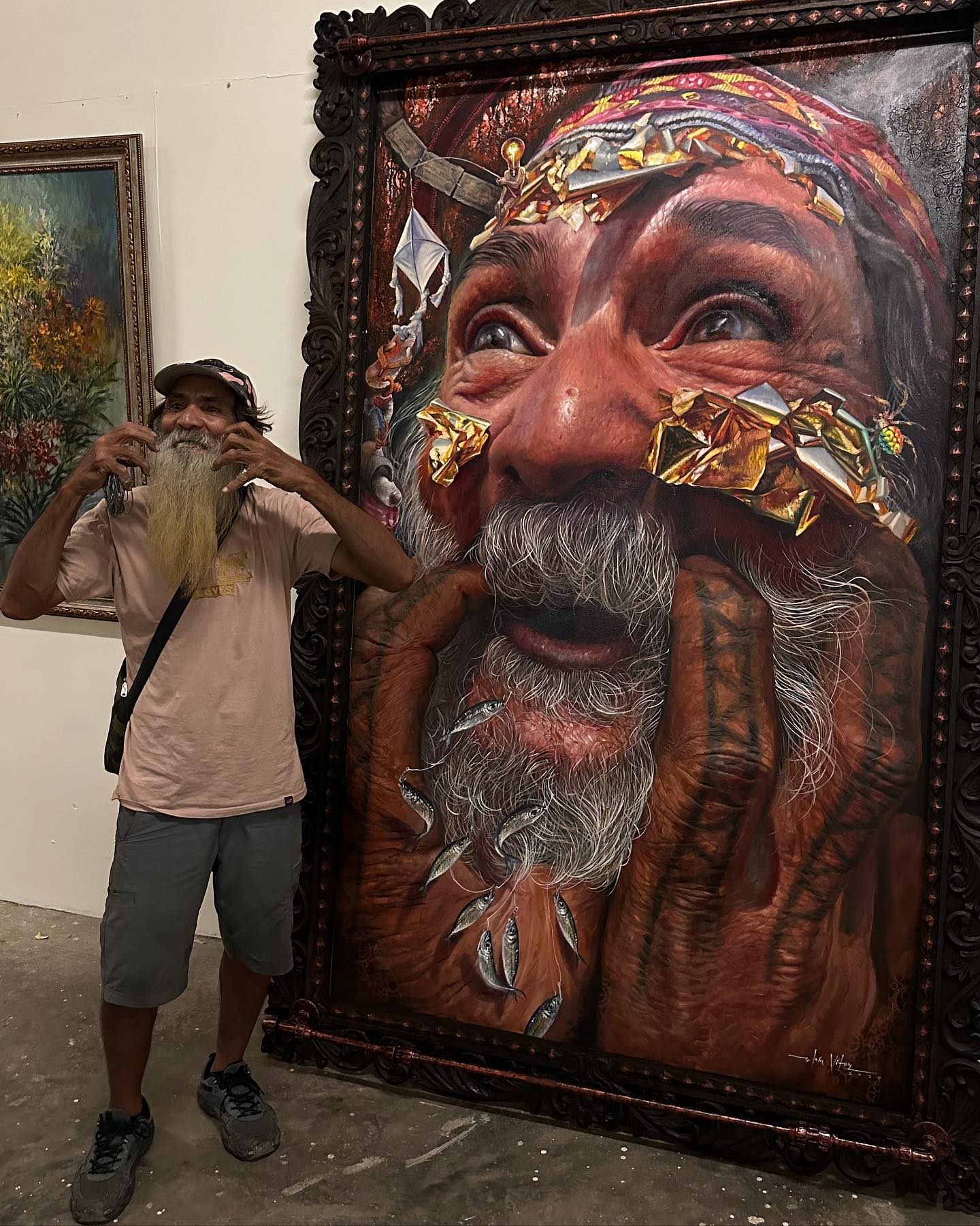 Artist Pedor Angco mimicking the pose of "Kulbahinam Nga Laraw." Photo by Elvin Vitor.