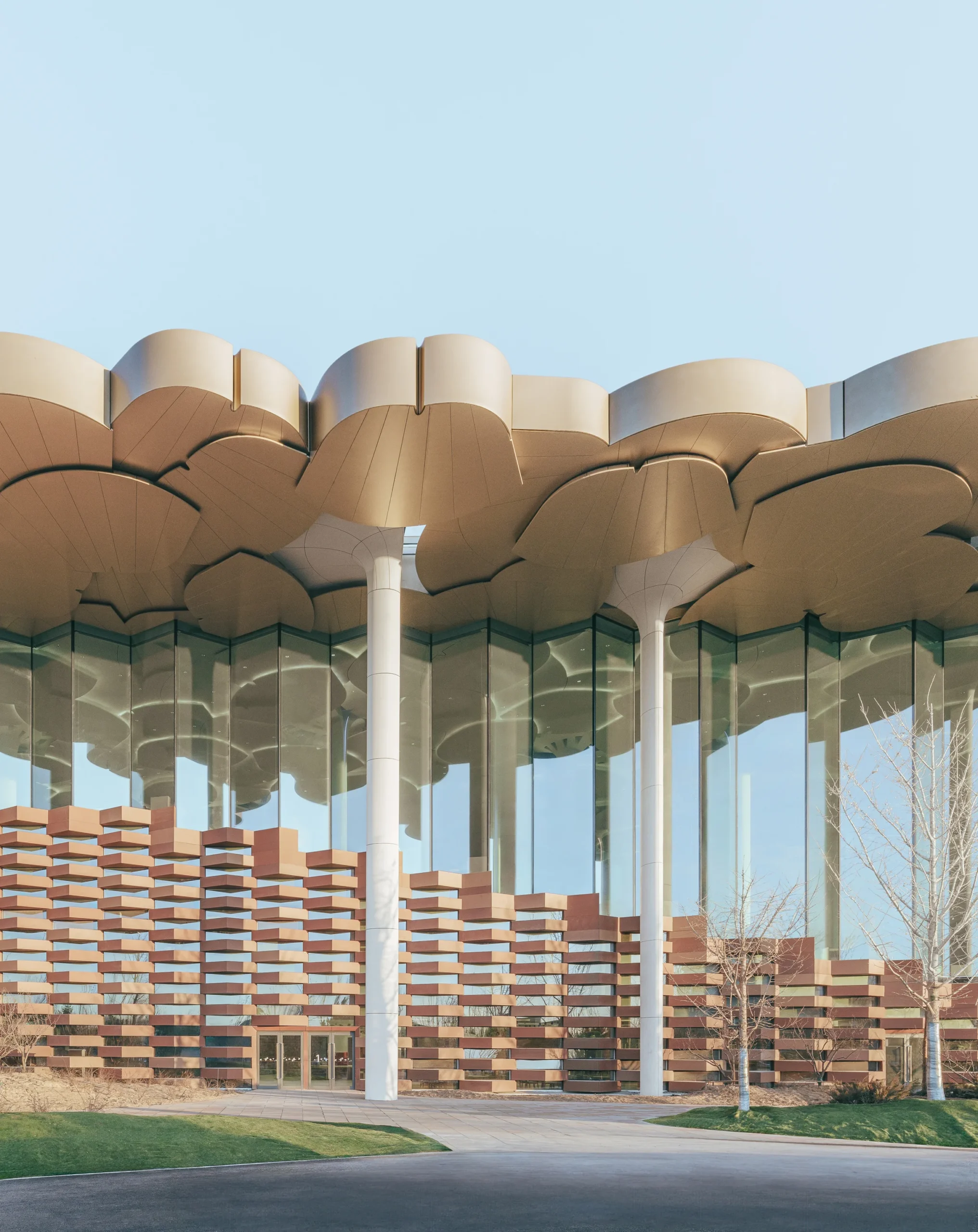 Exterior of Beijing City Library, with tall columns and round roofs mimicking trees.