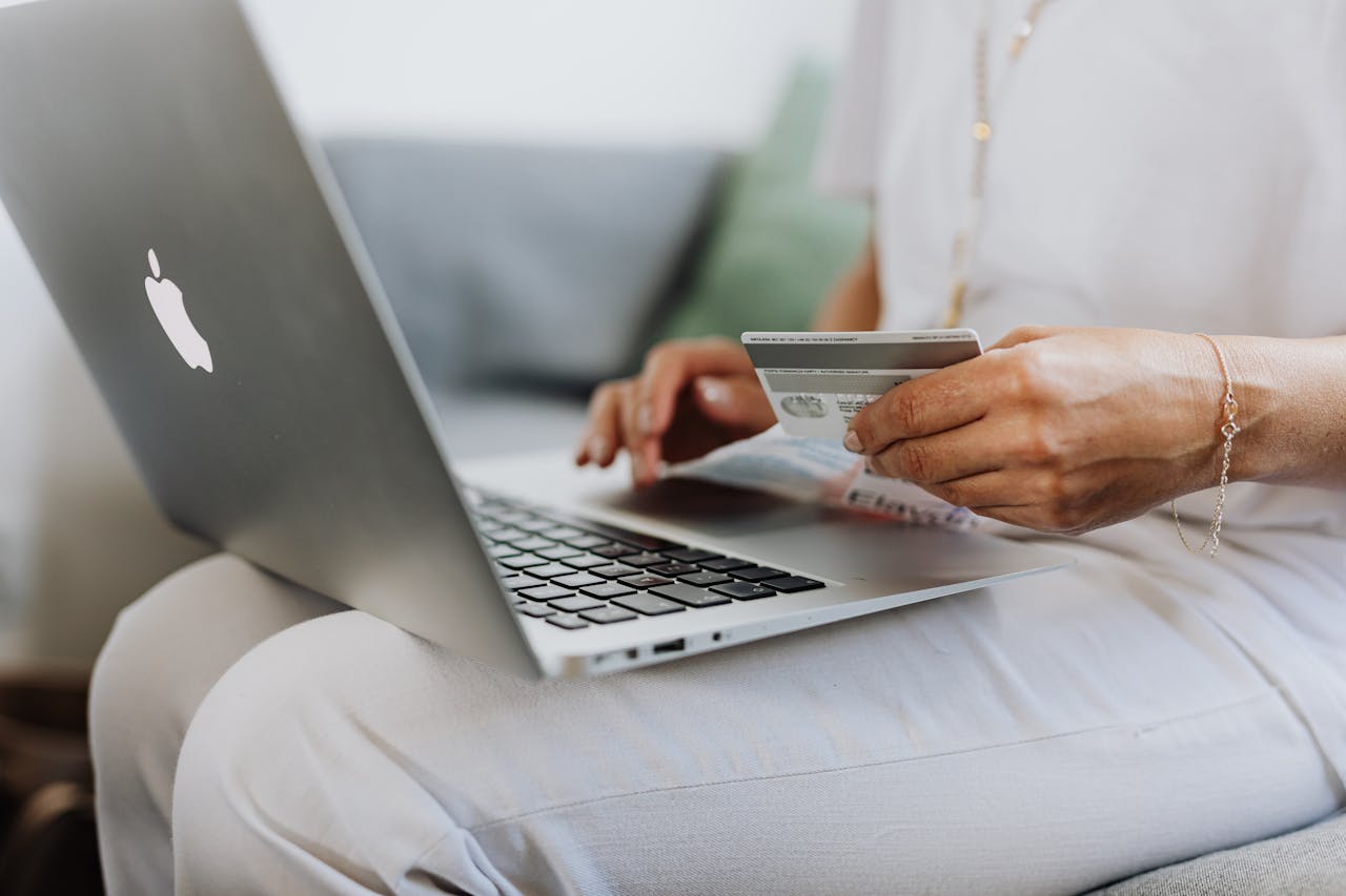 A person buying something online. Photo by Karolina Grabowska. Source: Pexels. 