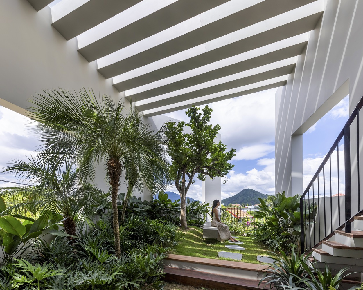 SkyGarden House's third floor garden is an example of biophilic design.
