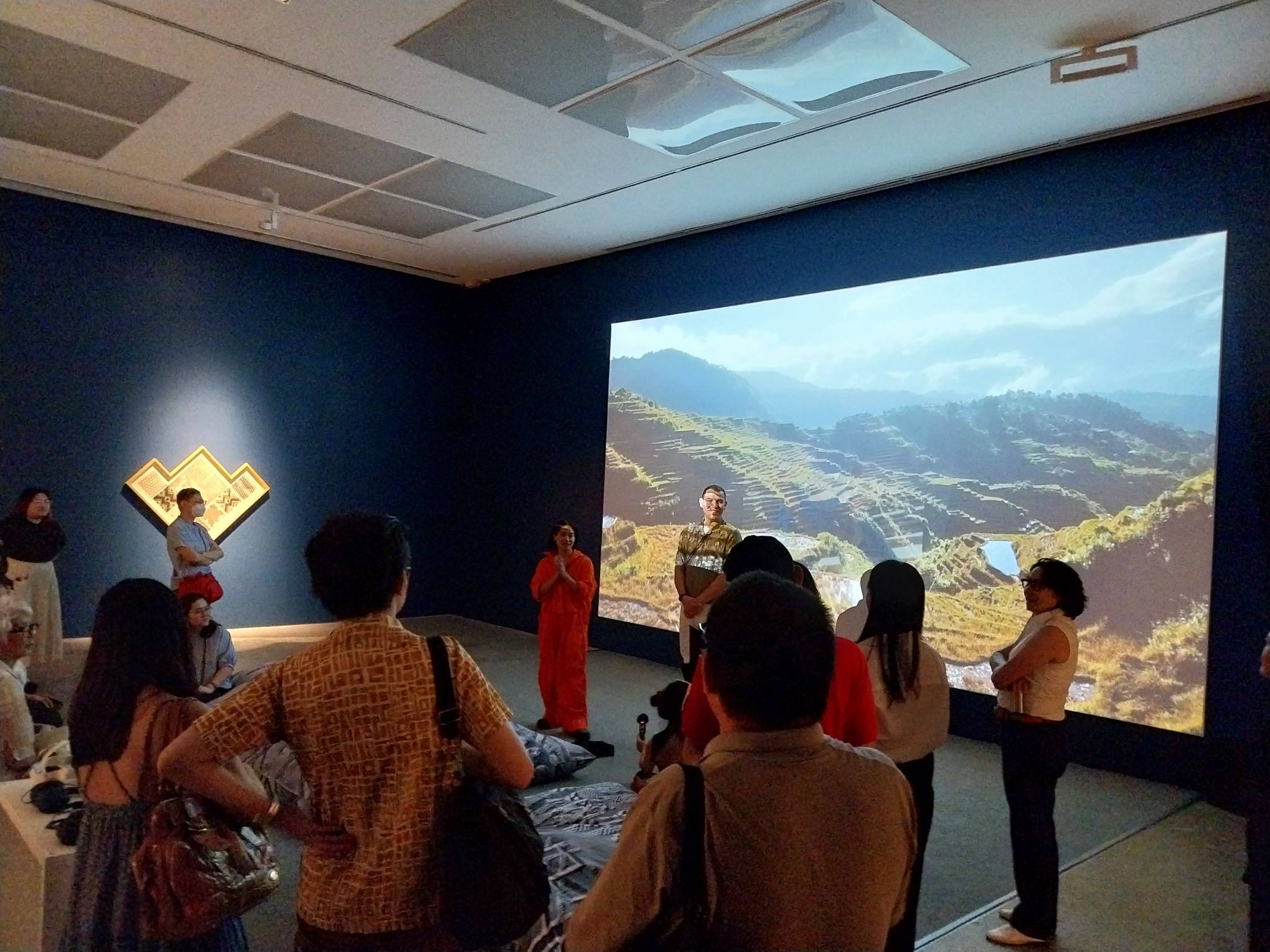 Comilang and Speiser discussing their exhibit on opening day. Photo by Elle Yap.
