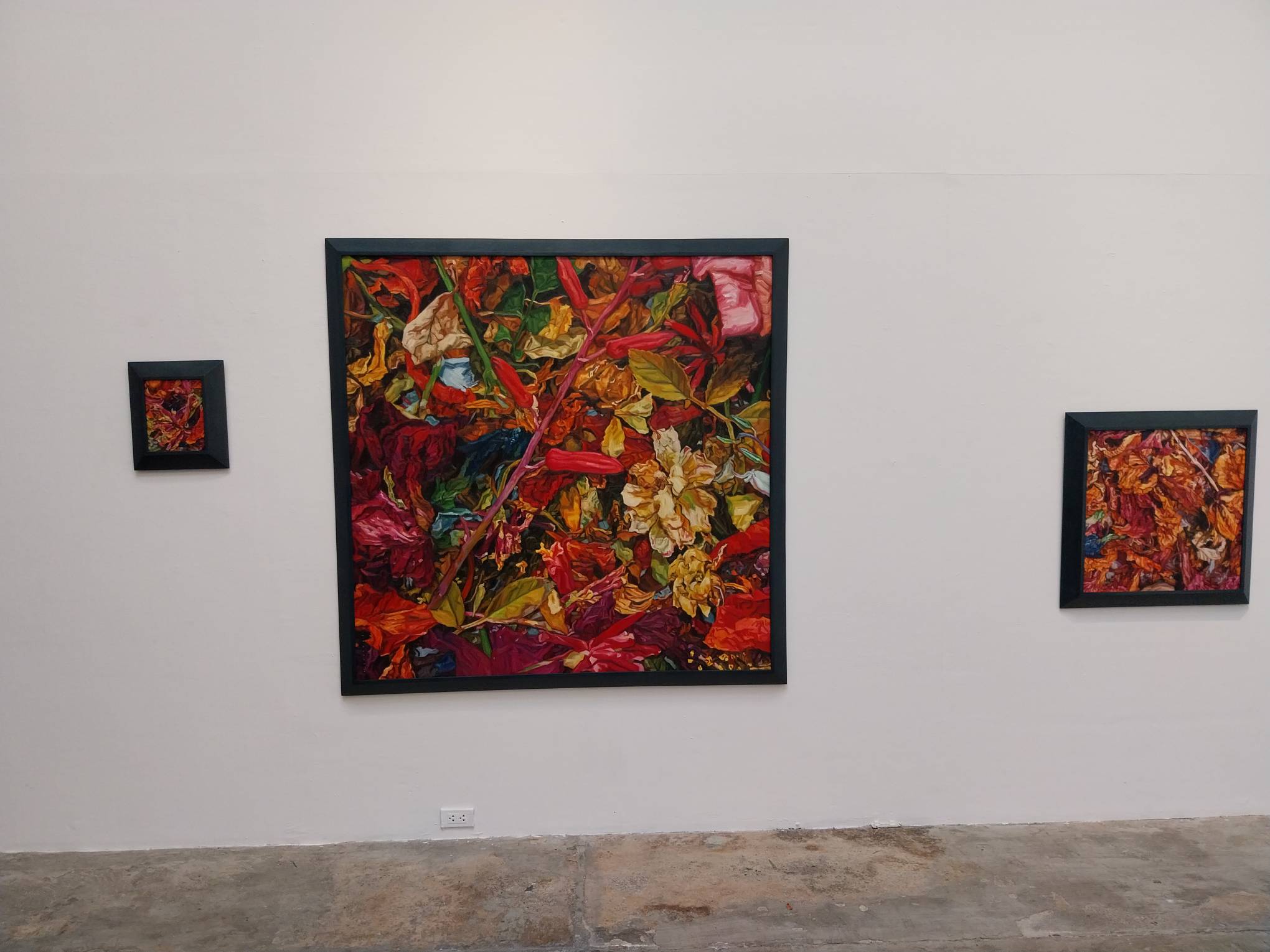 Three paintings by Shannah Orencio. Photo by Elle Yap.