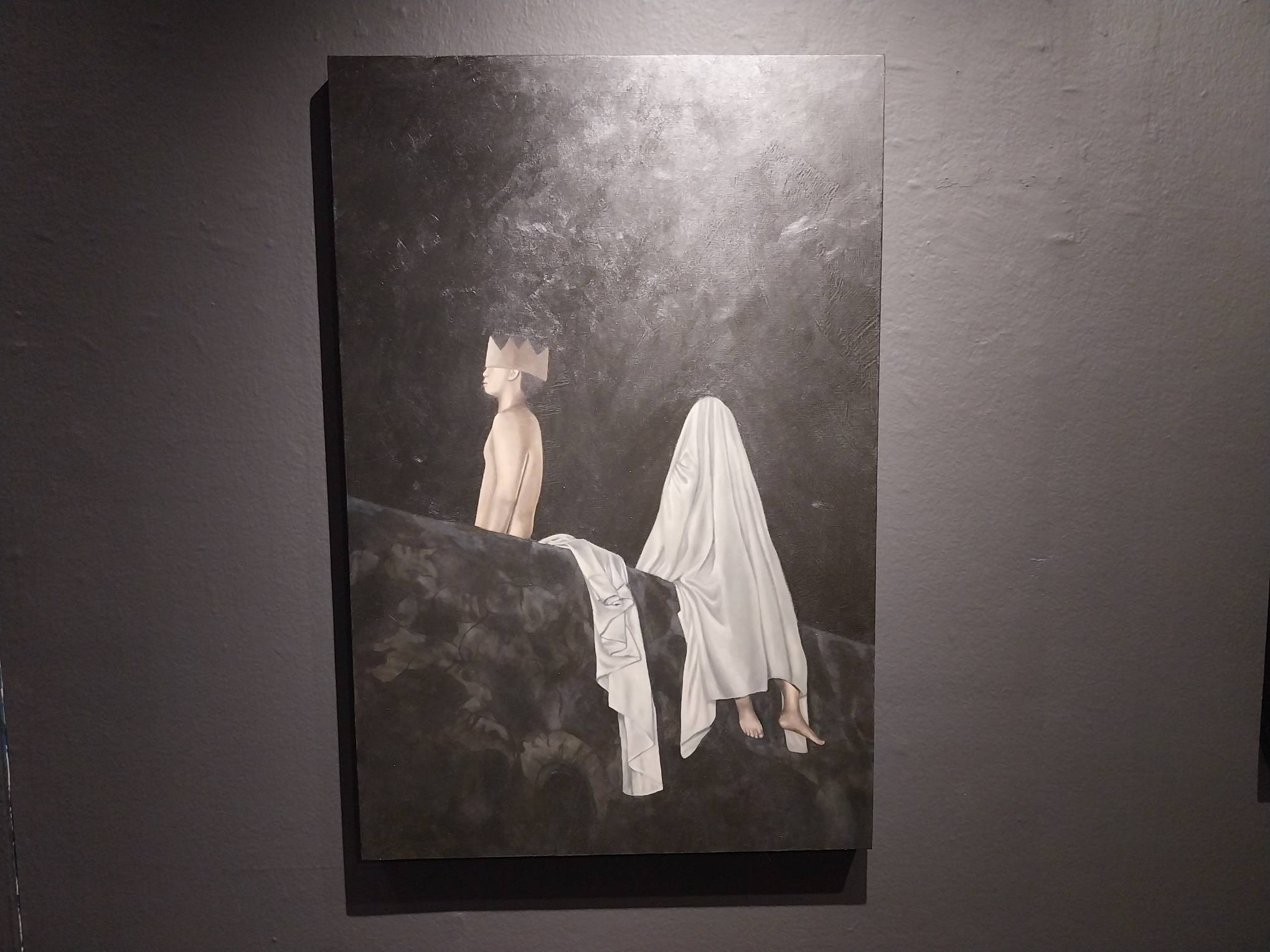 A ghost and a figure with a crown. Photo by Elle Yap.