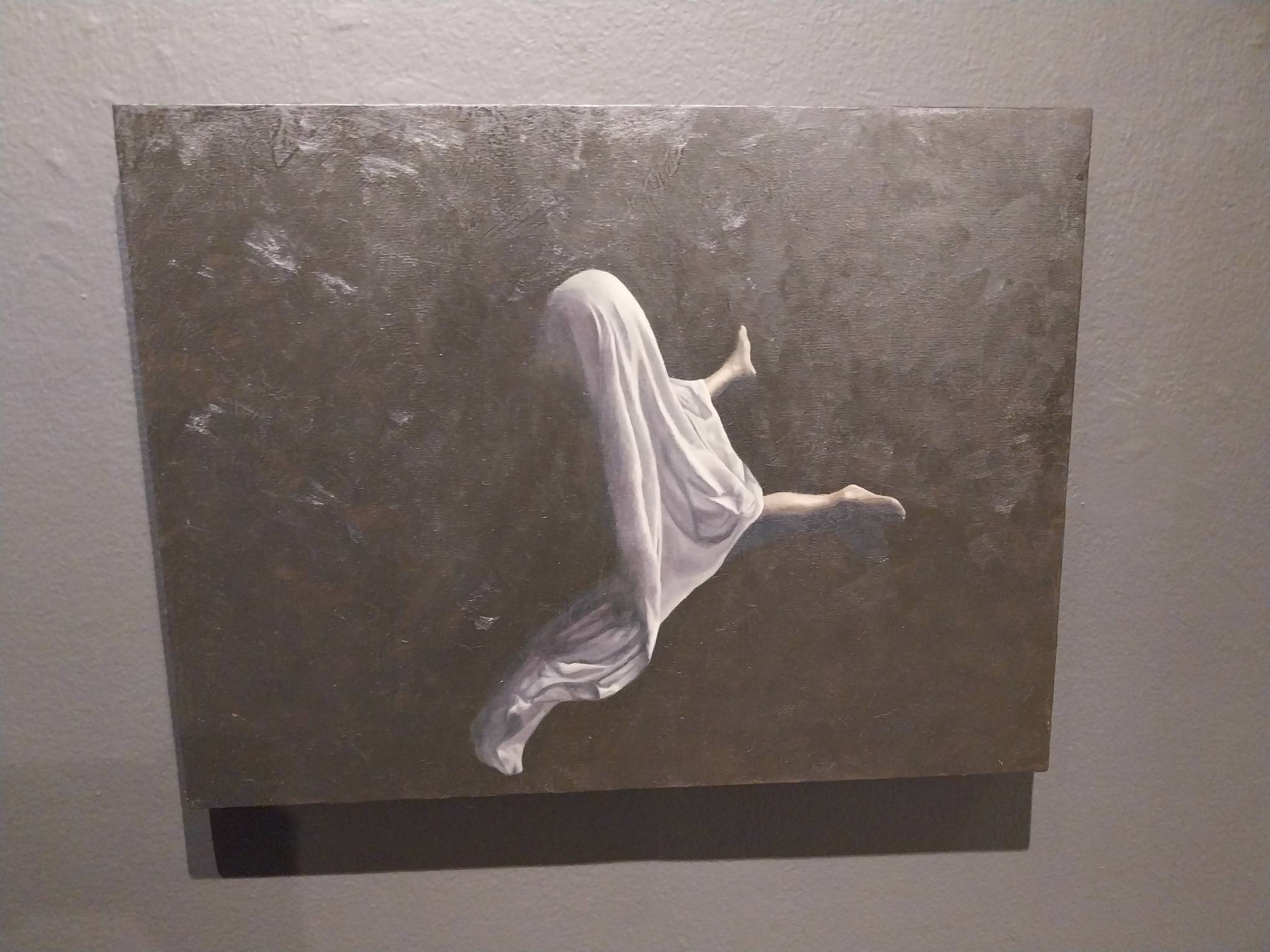 A running ghost-like figure painting by Gelo Montiero. Photo by Elle Yap.
