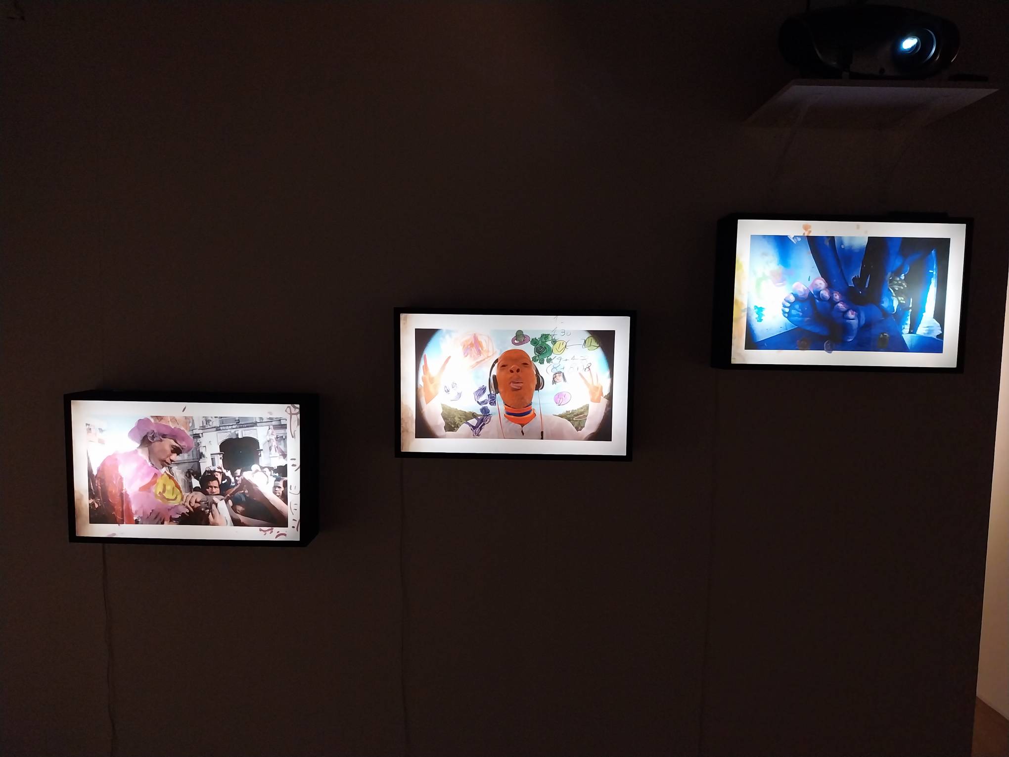 The Triptych of light boxes featured in "Hungkag." Photo by Elle Yap.