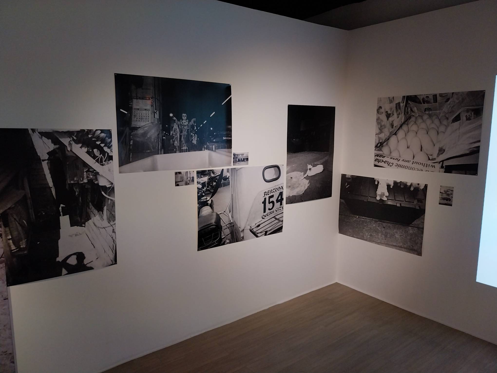 An assortment of photographs taken by Khavn. Photo by Elle Yap.