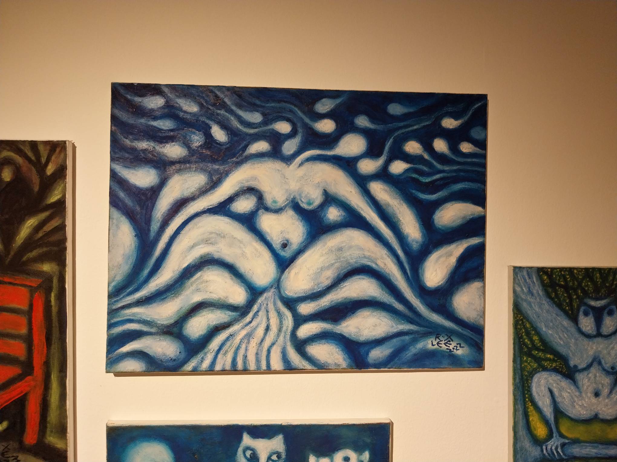 A woman surrounded by semen. Photo by Elle Yap.