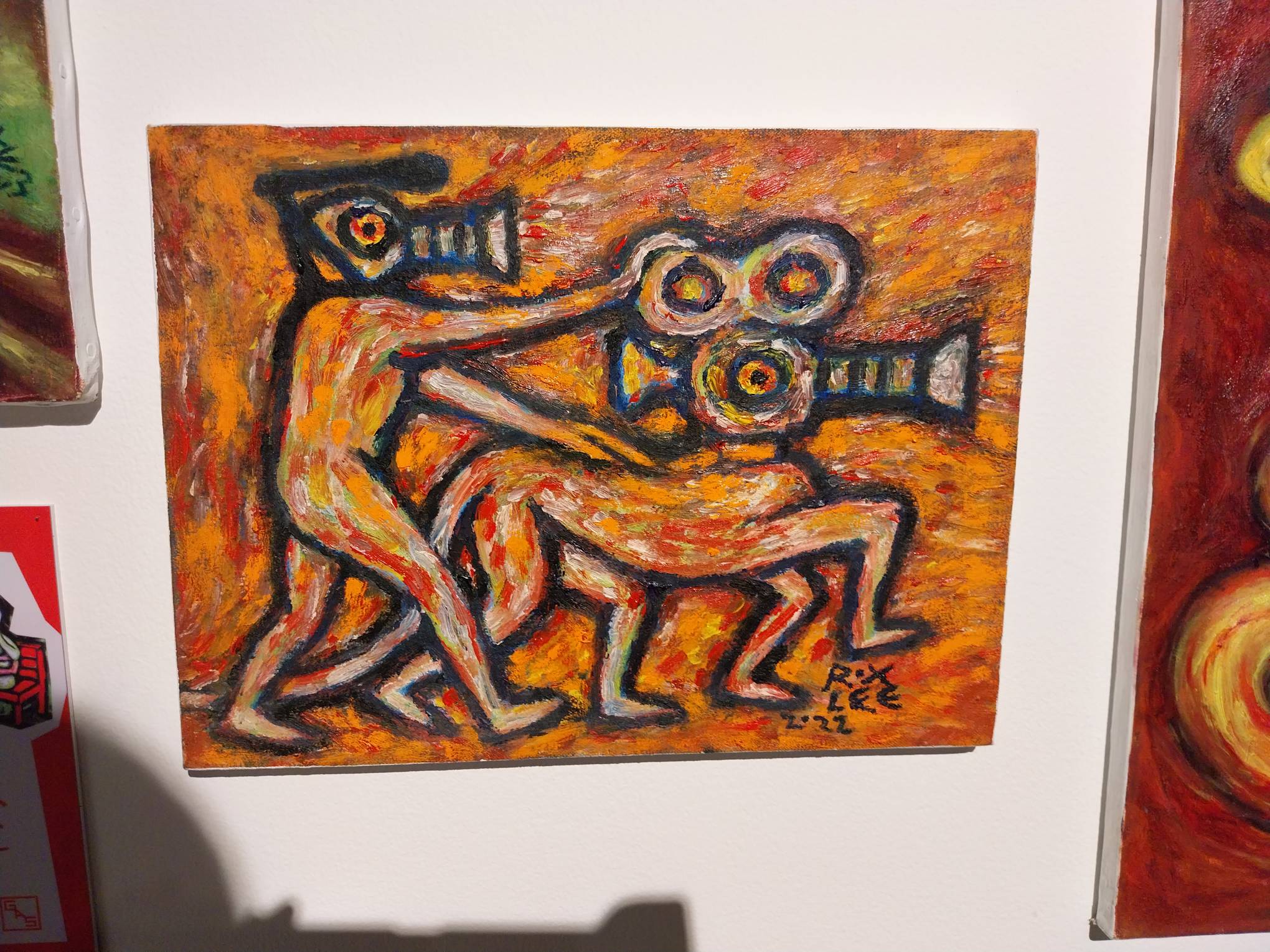 Orange painting by Roxlee for "Violent Camote." Photo by Elle Yap.