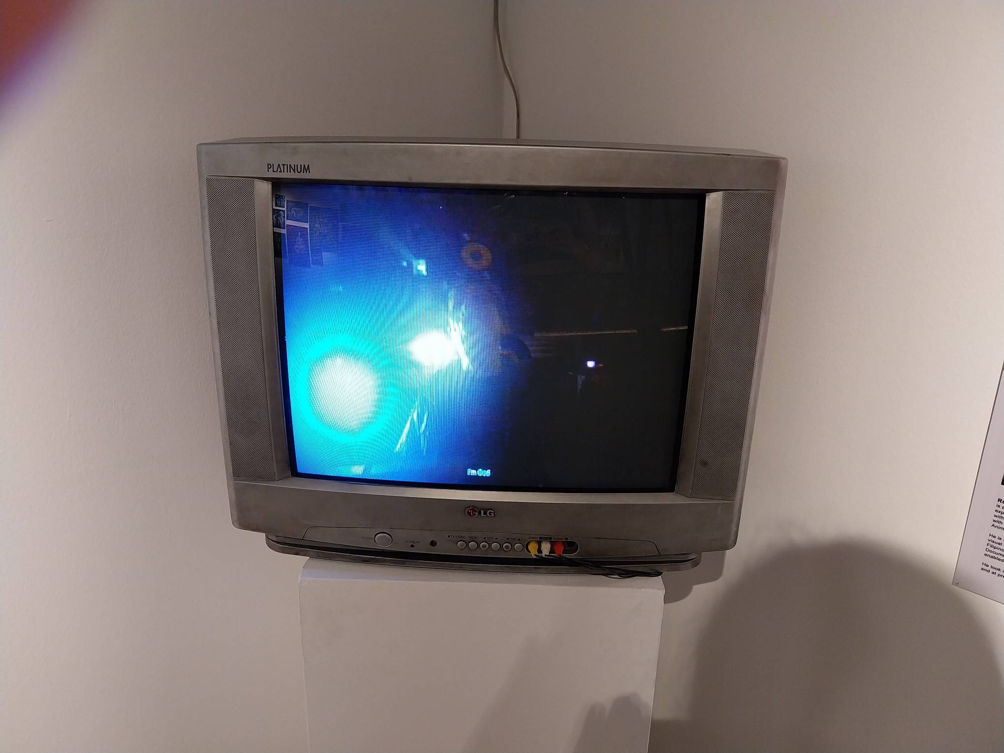 A portion of the short film where the figure calls themselves god. Photo by Elle Yap.